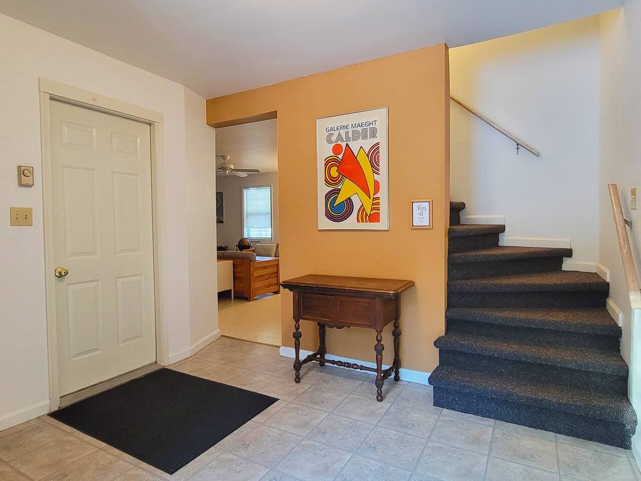 This is what you will see once you enter the home, entrance to lower level living room and stars to main living area and kitchen