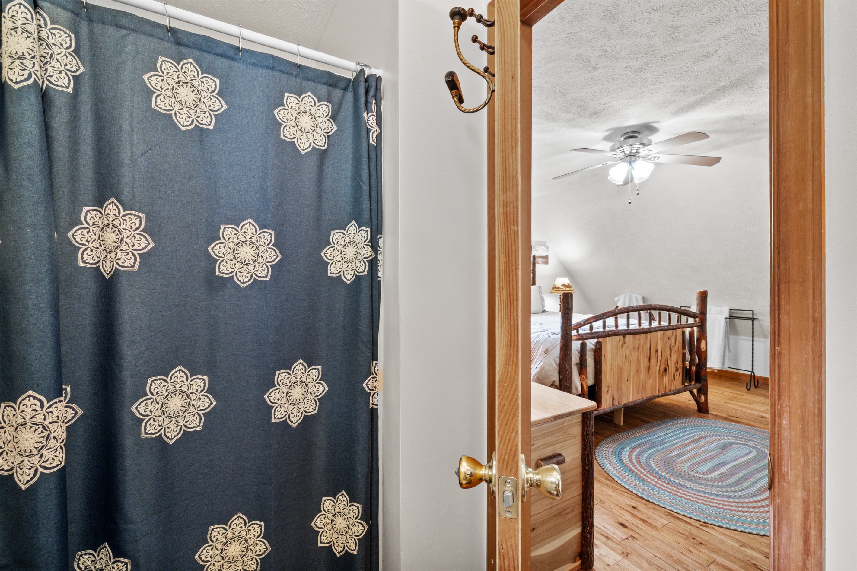 En-suite bathroom on 2nd floor, adjacent to room with King size bed