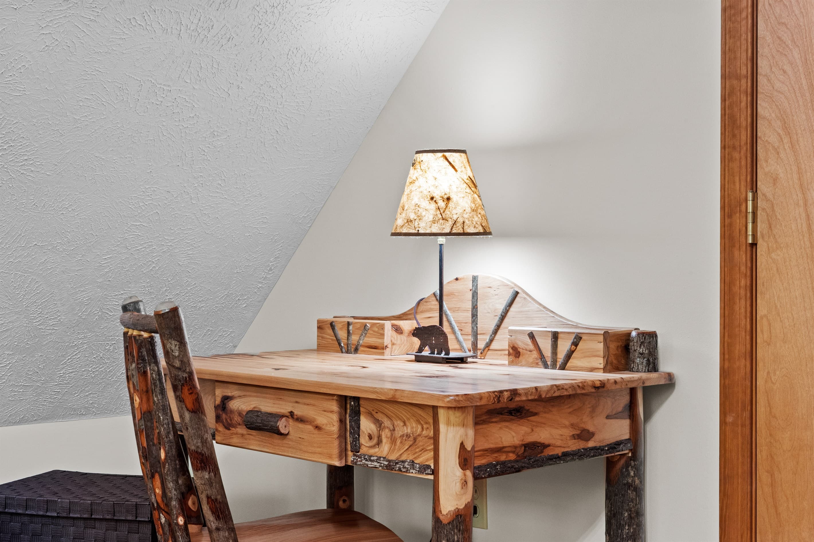 Laptop workspace in loft area