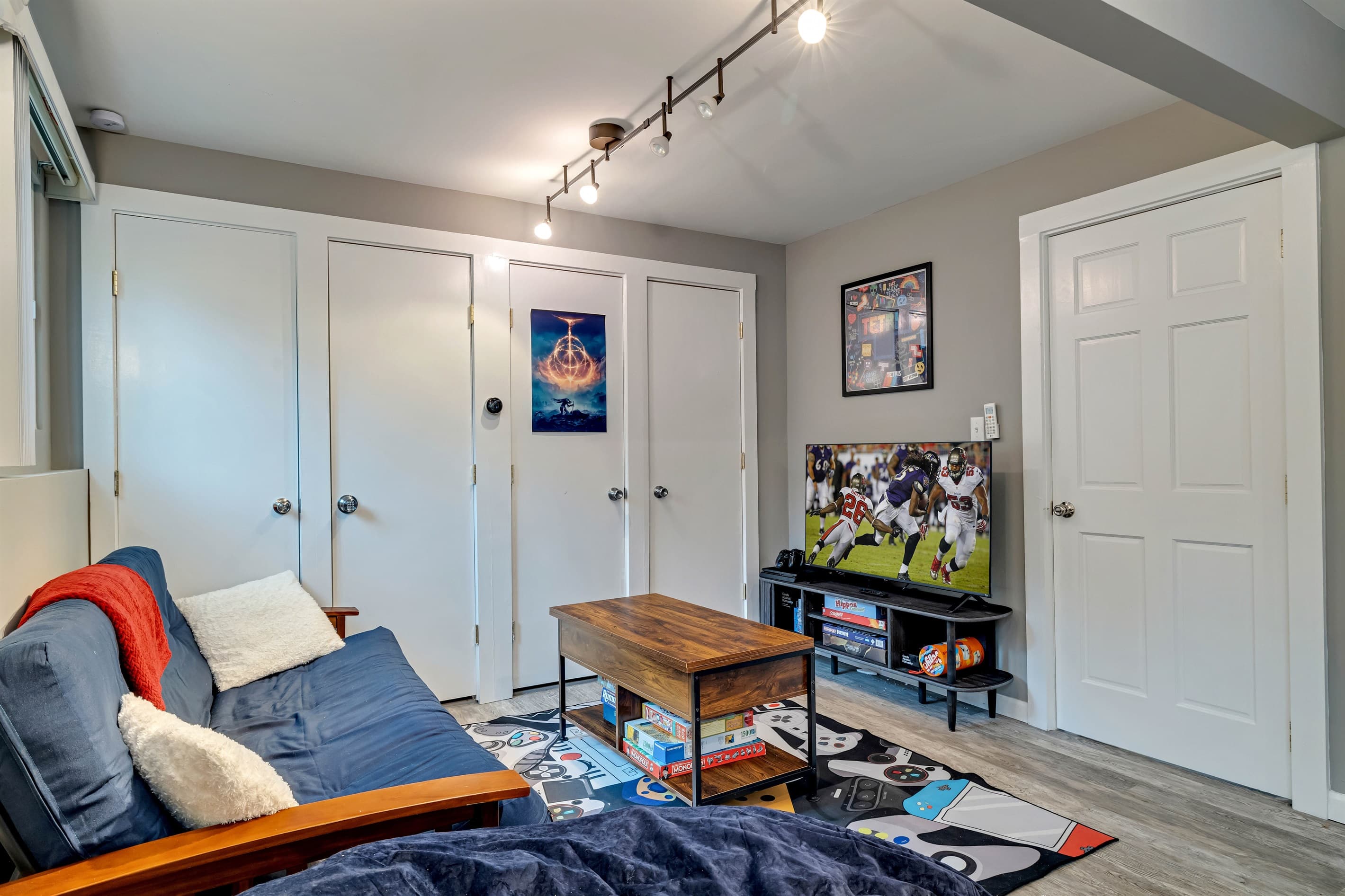 Relax on the comfy couch and catch your favorite shows or movies on the TV in the game room.