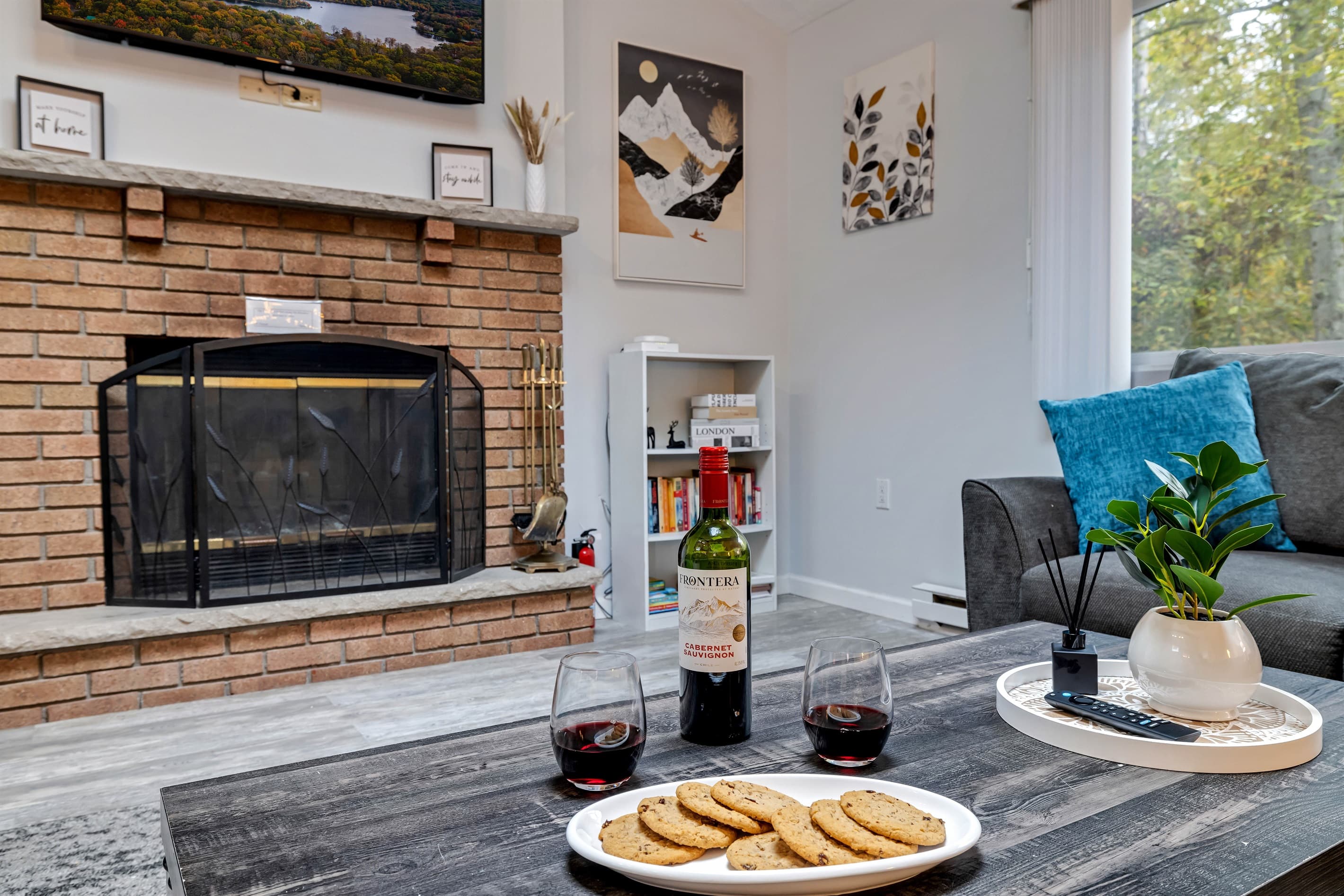 Cozy wood-burning fireplace, offering warmth and ambiance for a relaxing atmosphere