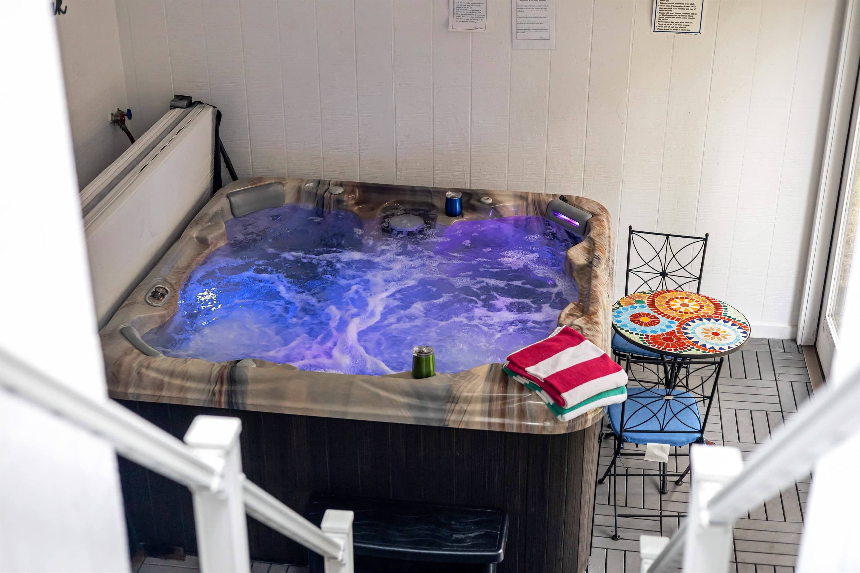 Unwind in the ultimate relaxation space with a private 2-person sauna and a soothing hot tub, perfect for rejuvenation | Pocono Mountains
