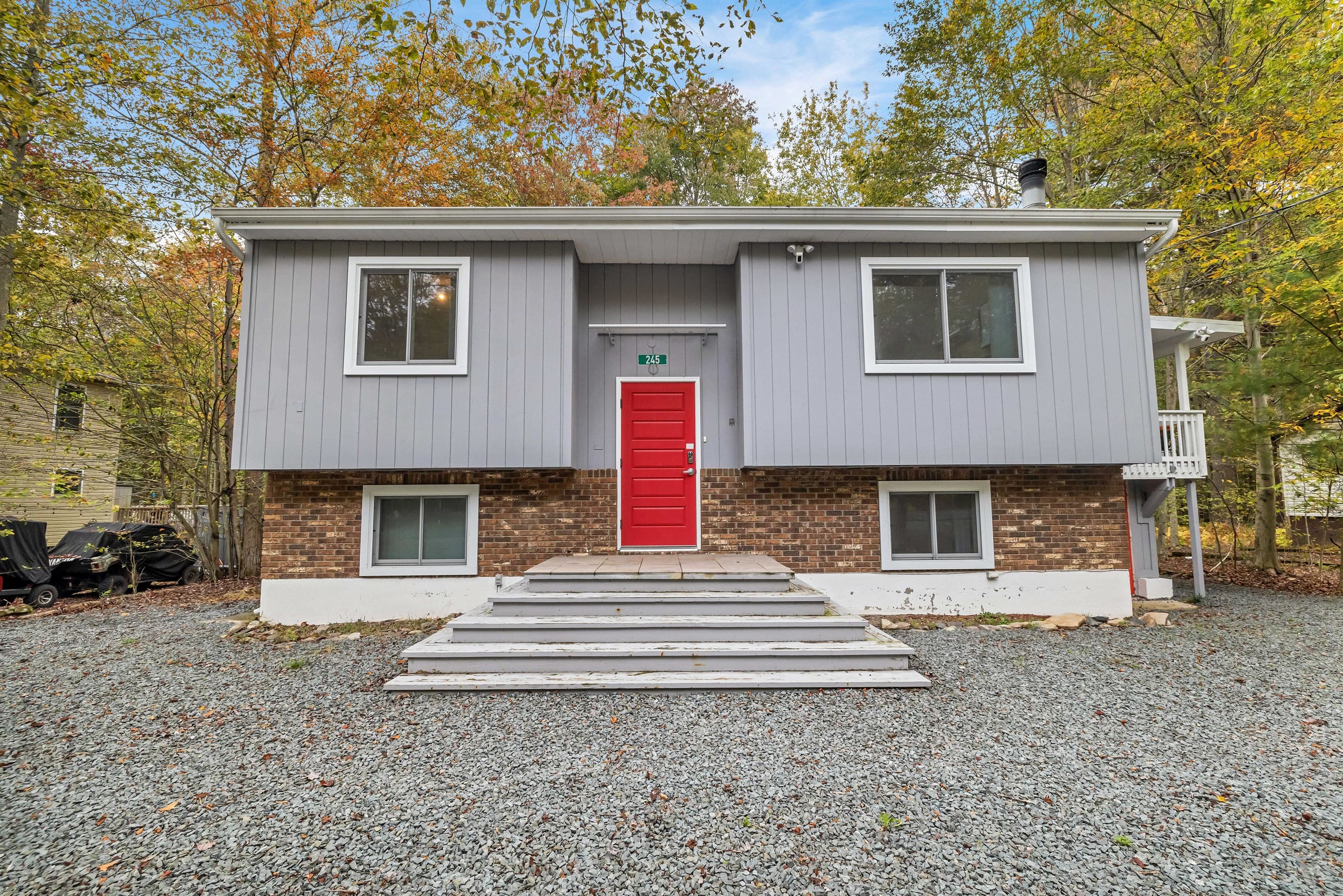 Exterior view of the home, surrounded by nature and perfect for a peaceful getaway.