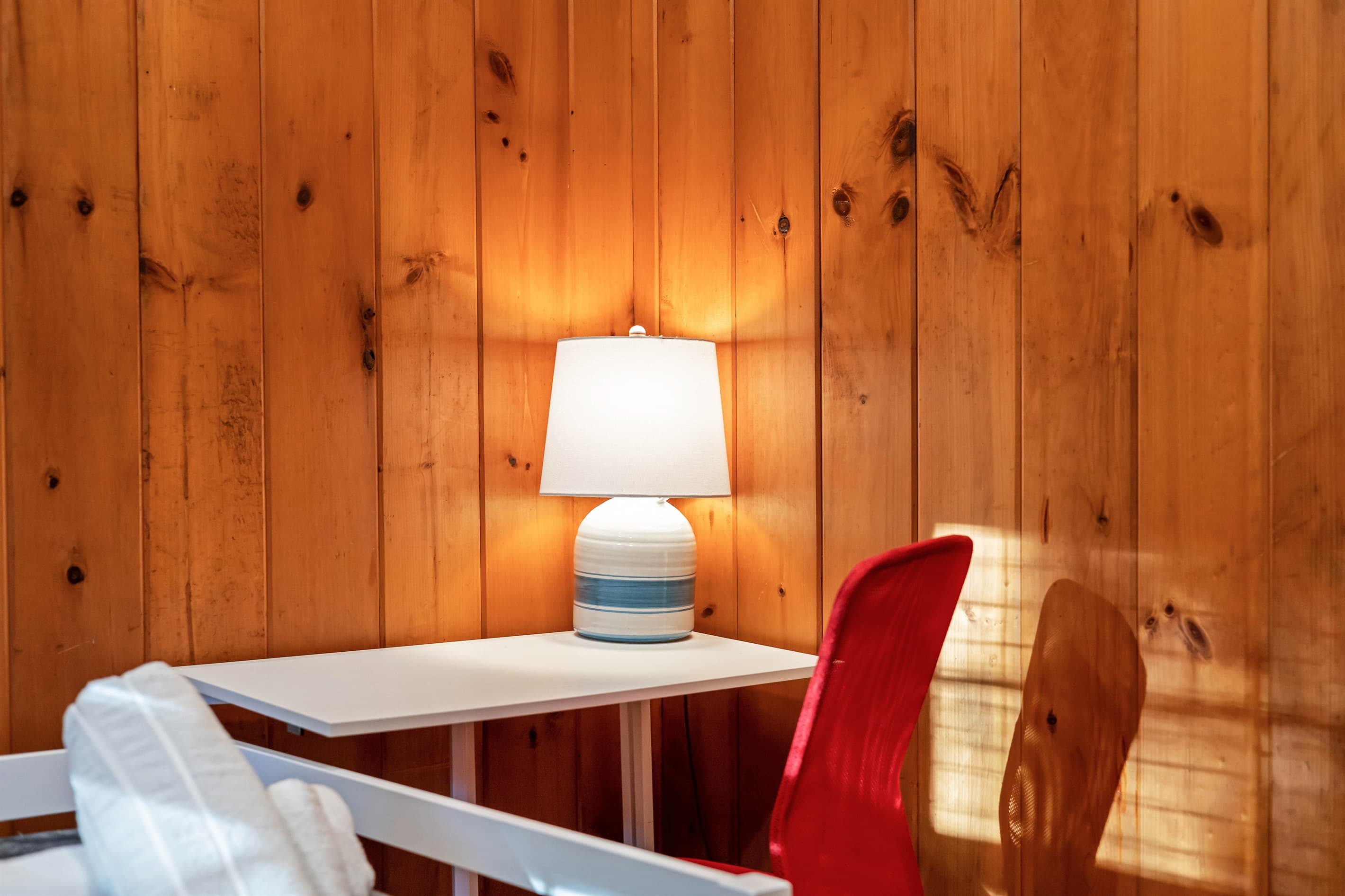 Small workspace with a desk and chair, ideal for laptop use and light work during your stay. A simple, functional spot to stay productive