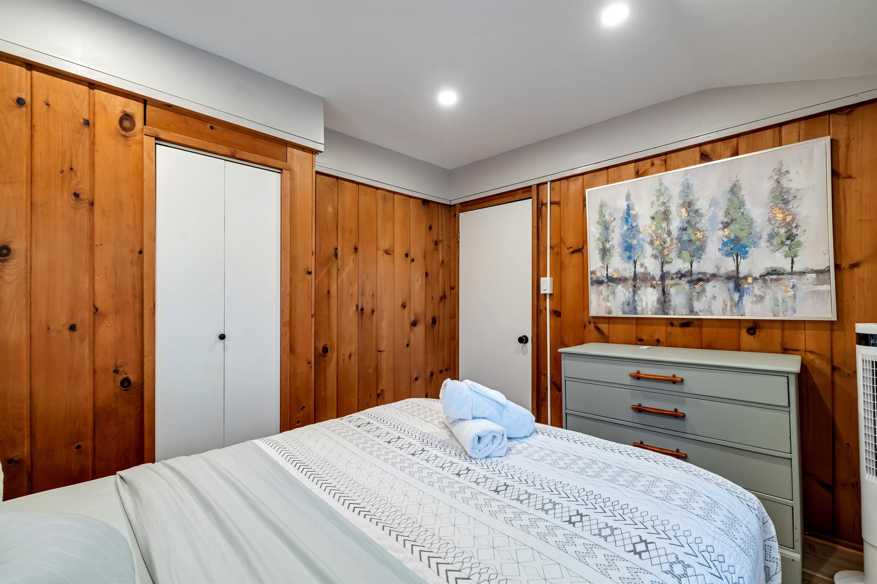 Bedroom featuring a comfortable bed and inviting decor, providing a peaceful retreat for a restful night’s sleep during your stay