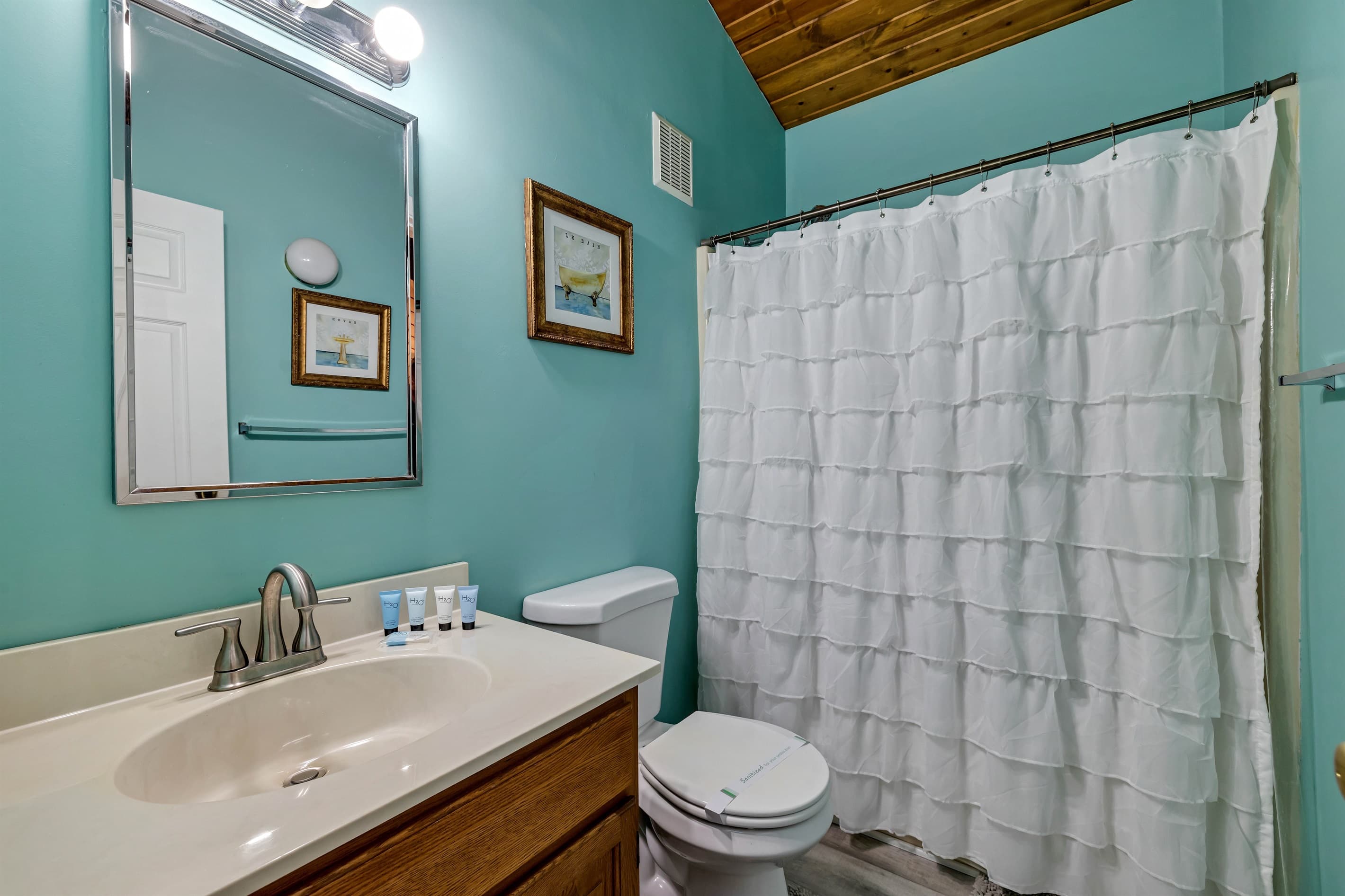 Full bathroom featuring a relaxing tub, perfect for unwinding after a long day. Enjoy a soothing soak in a serene and inviting space