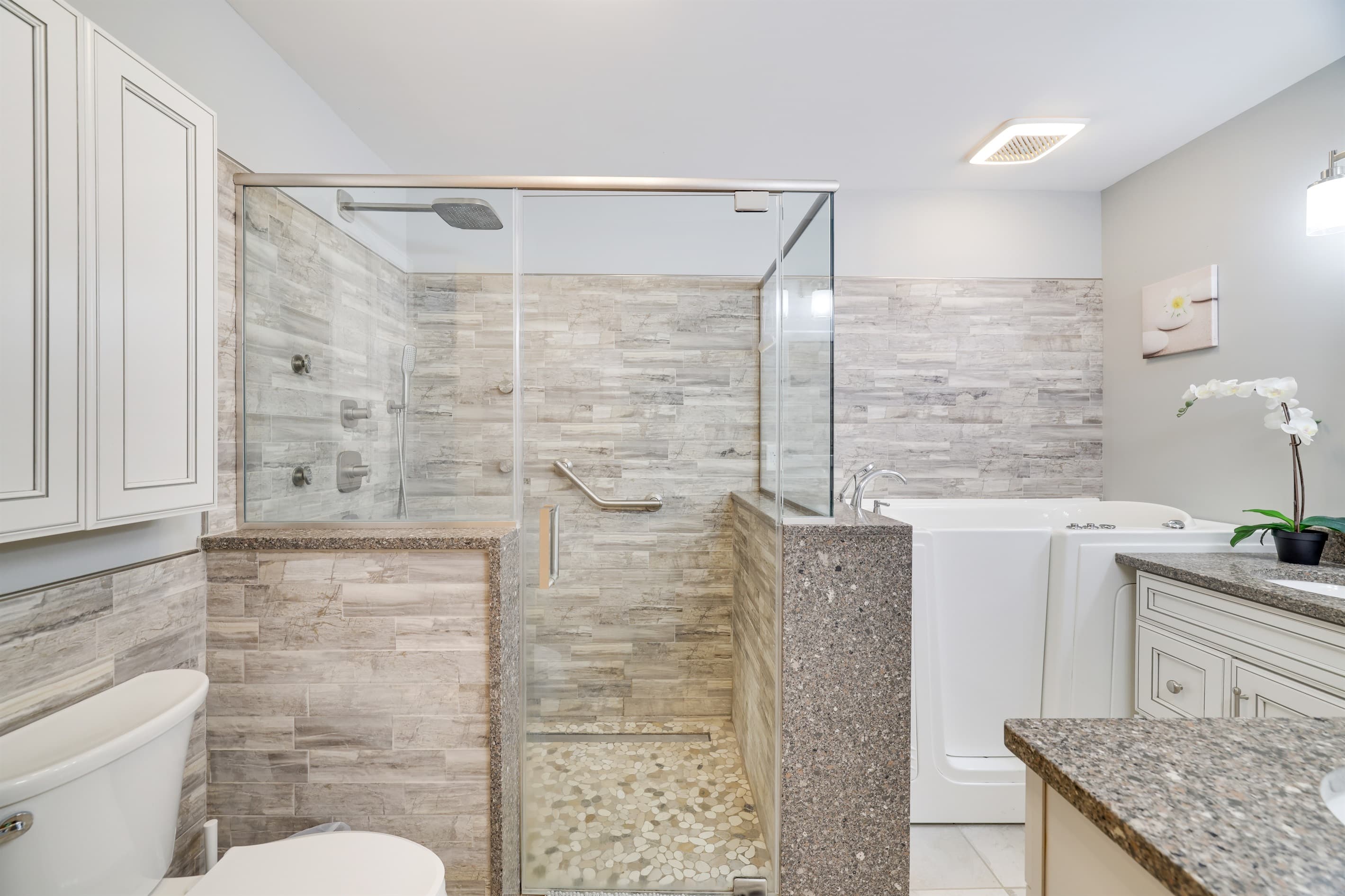 Bathroom with tub, shower