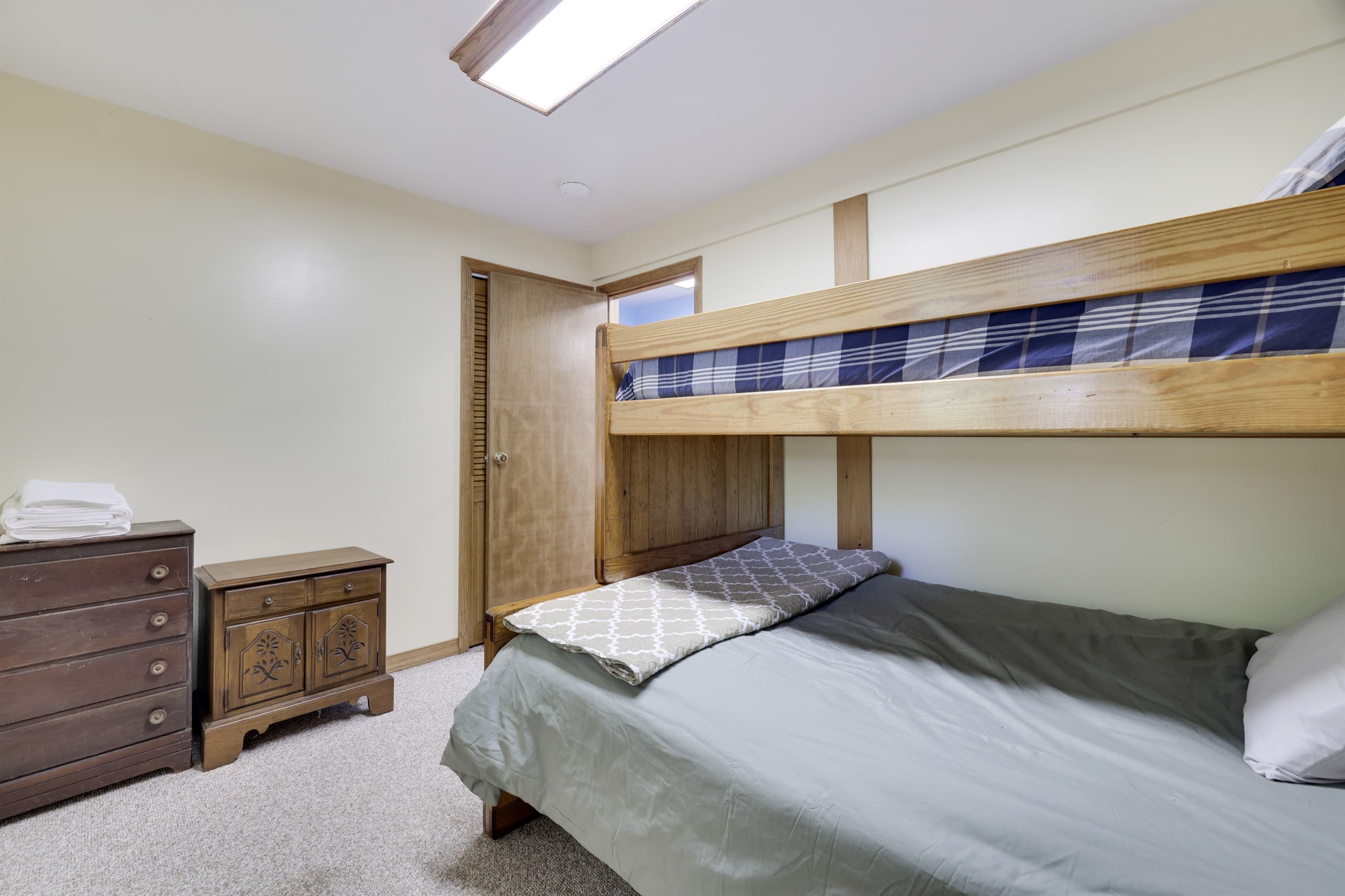 Lower level bedroom with bunk bed
