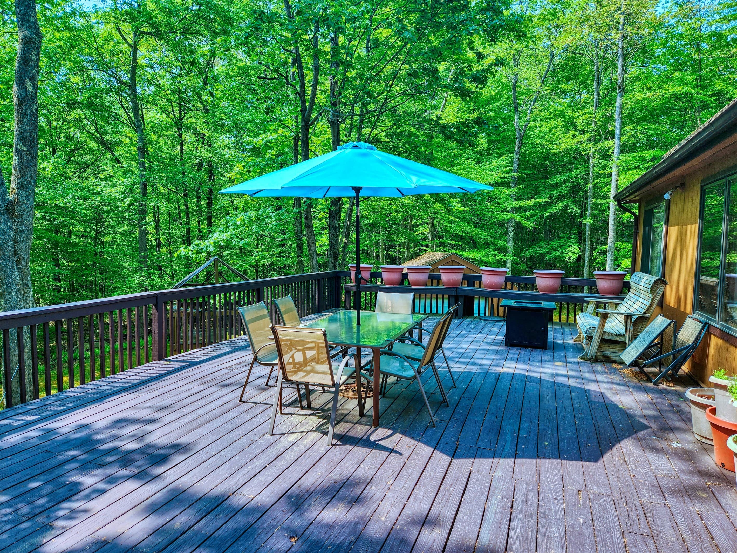 Oversized deck with seating, table and BBQ grill