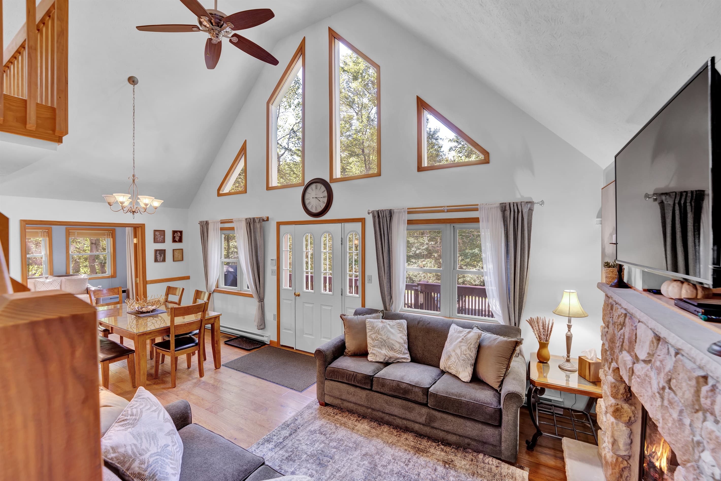 Living room with TV, propane fireplace and comfortable seating