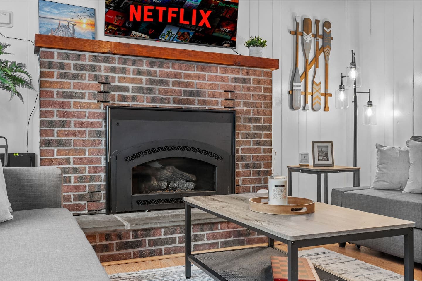Cozy living room with smart TV and comfy couches