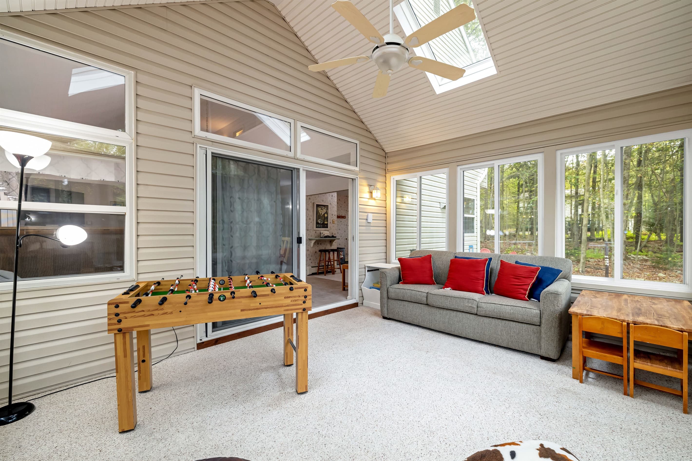 Sunroom with foosball and board games. Or just sit and relax!