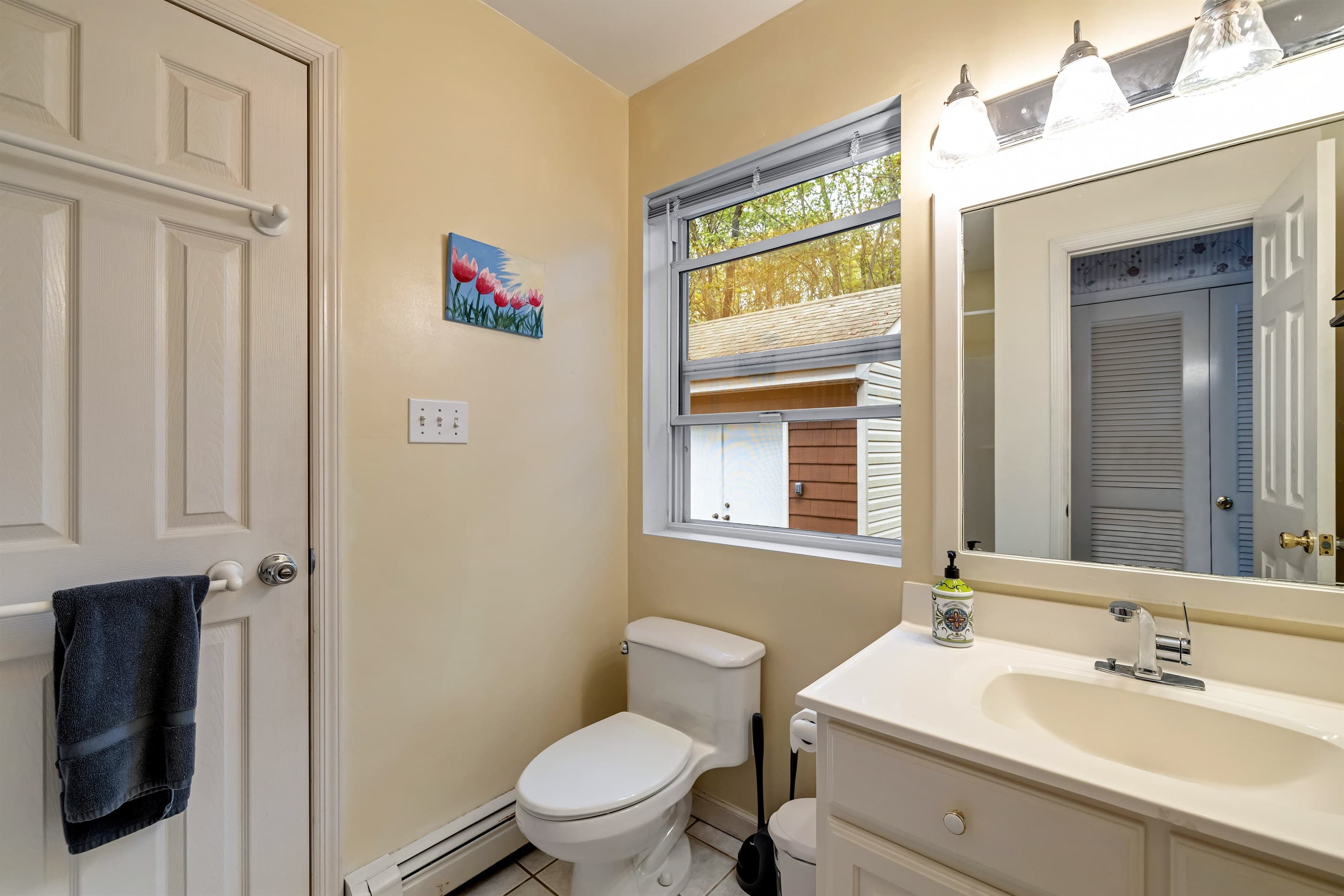 Bathroom on 1st floor with shower, vanity