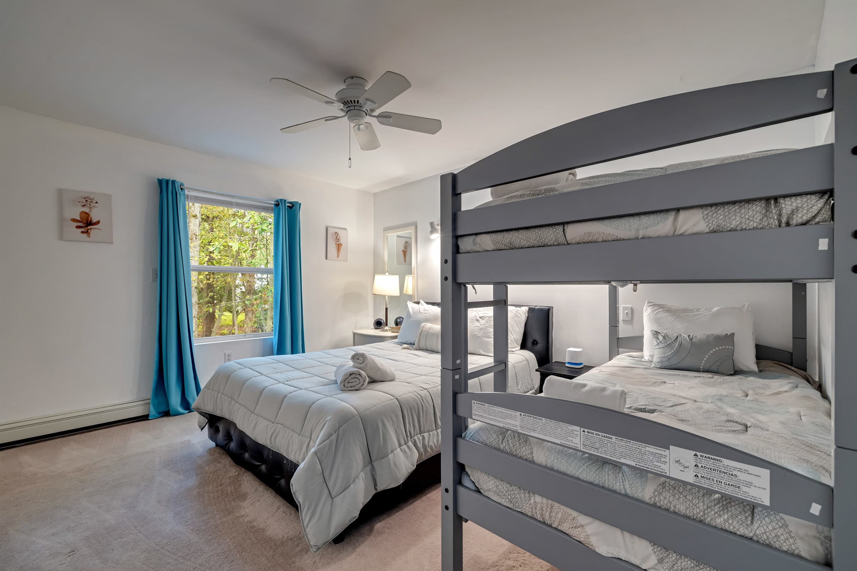 Bedroom on 2nd floor. Queen and bunk beds