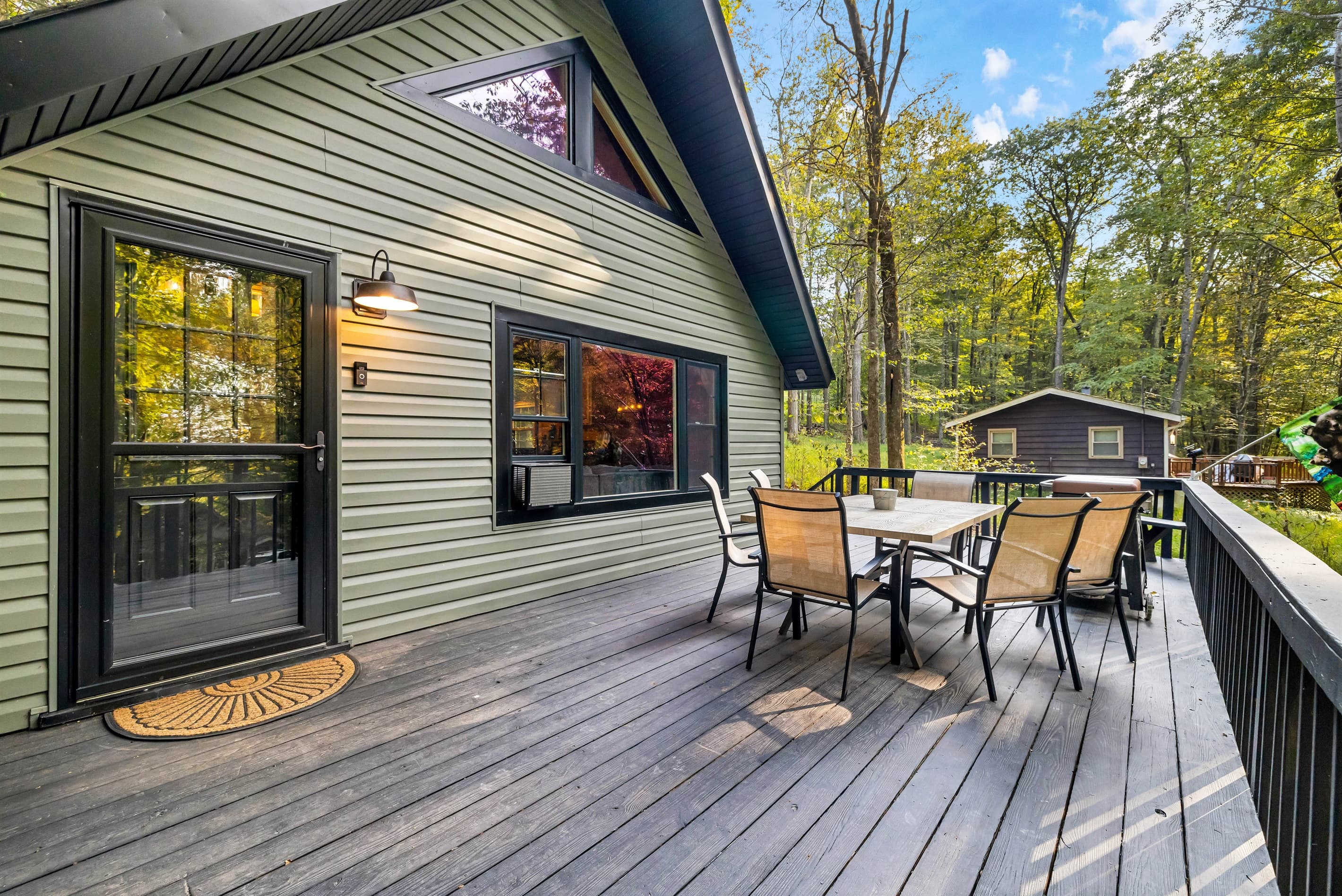 Deck with griddle and table with seating