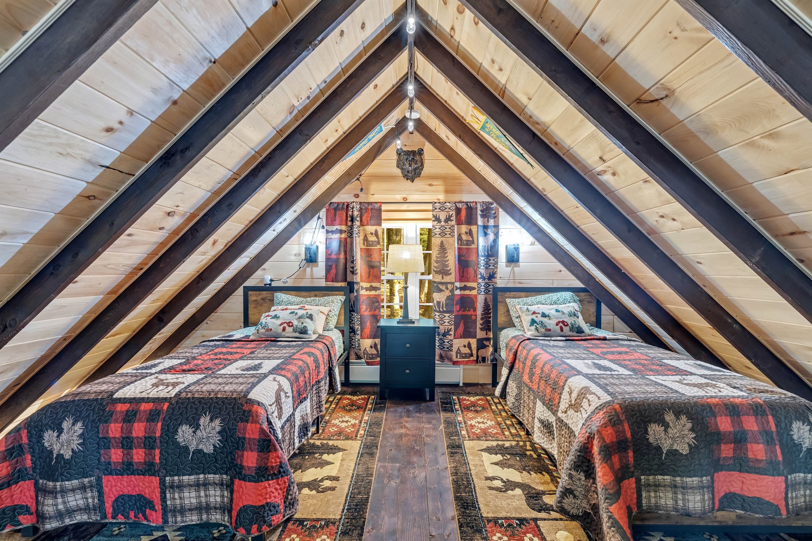 Loft with two twin beds and foosball table