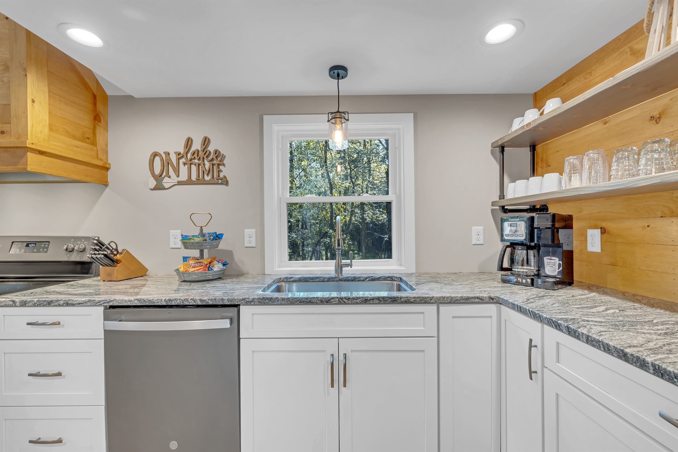 Kitchen with stainless appliances and granite countertops