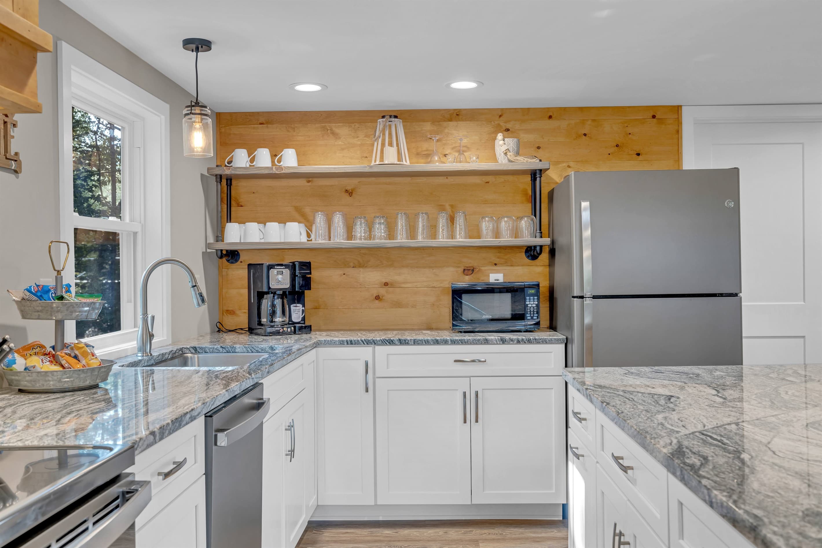 Kitchen with stainless appliances and granite countertops