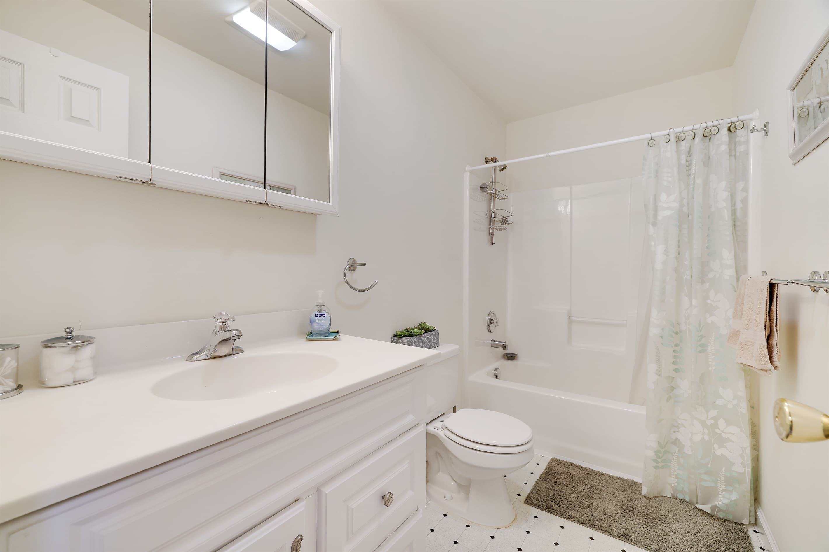 We have 2 similar full bathrooms, one on each floor