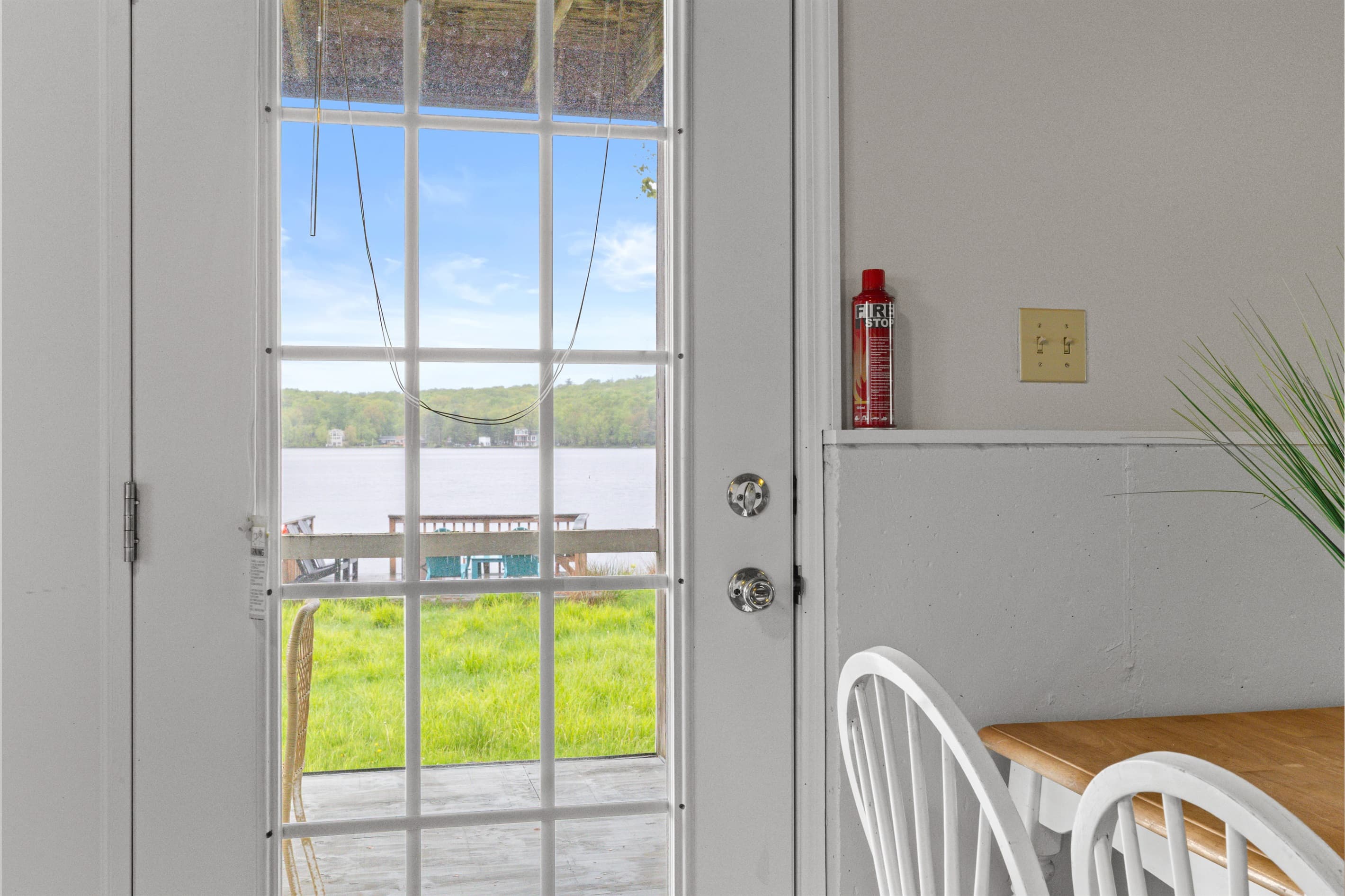 Bonus room offers extra space to spread out, featuring a full-size bed, a cozy TV sofa, and a small dining table—perfect for games, casual meals, or relaxing with a movie.
