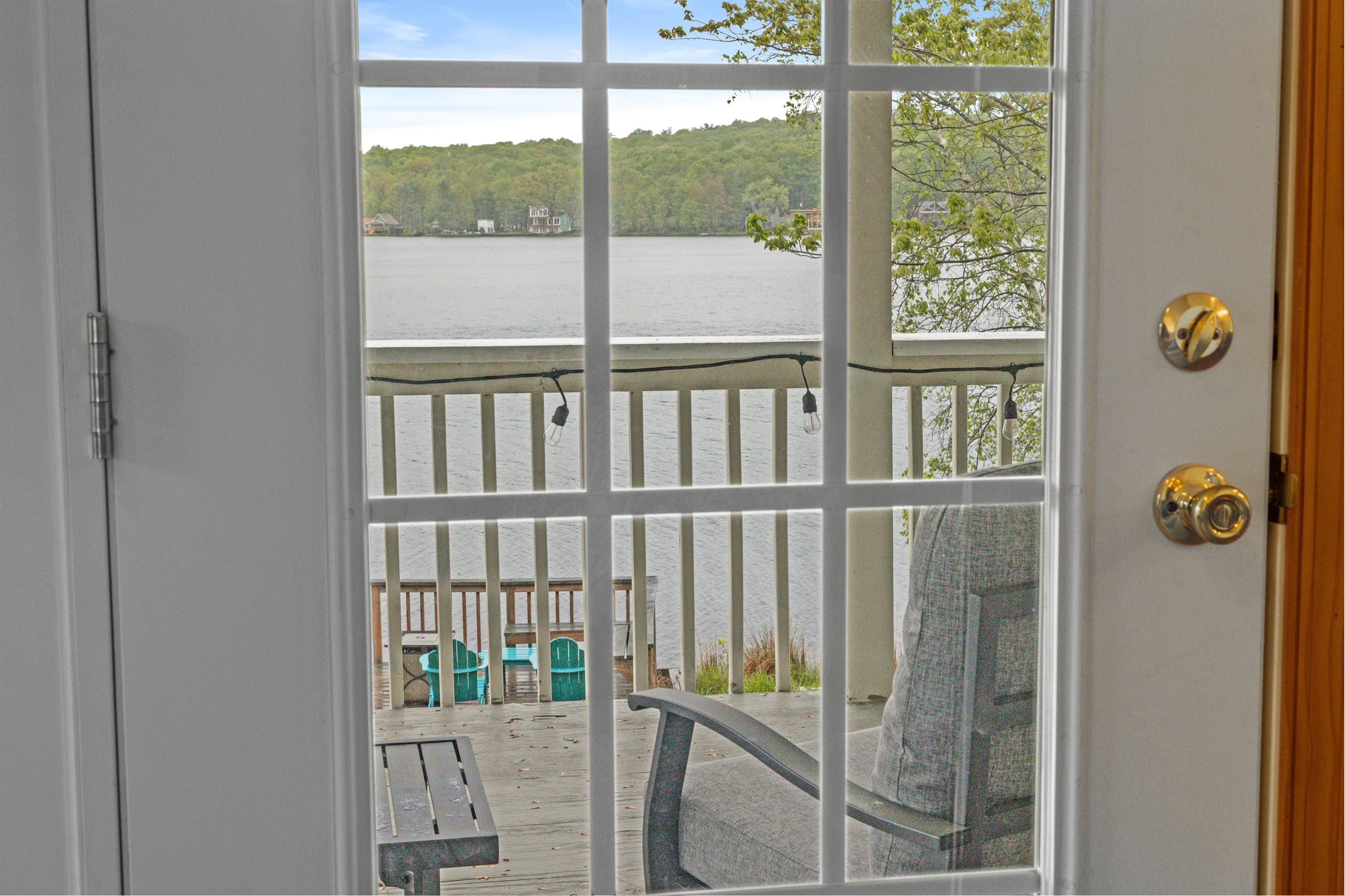 View of the balcony and the lake from the living room