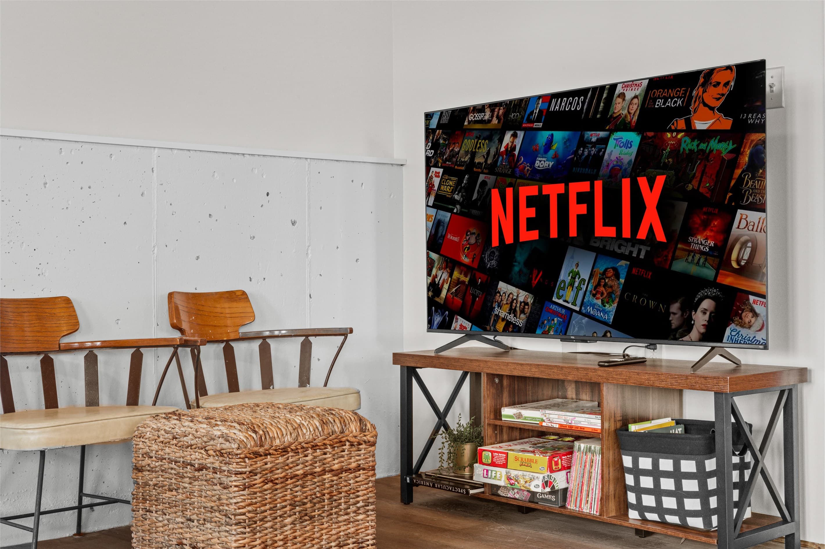 Bonus room offers extra space to spread out, featuring a full-size bed, a cozy TV sofa, and a small dining table—perfect for games, casual meals, or relaxing with a movie.