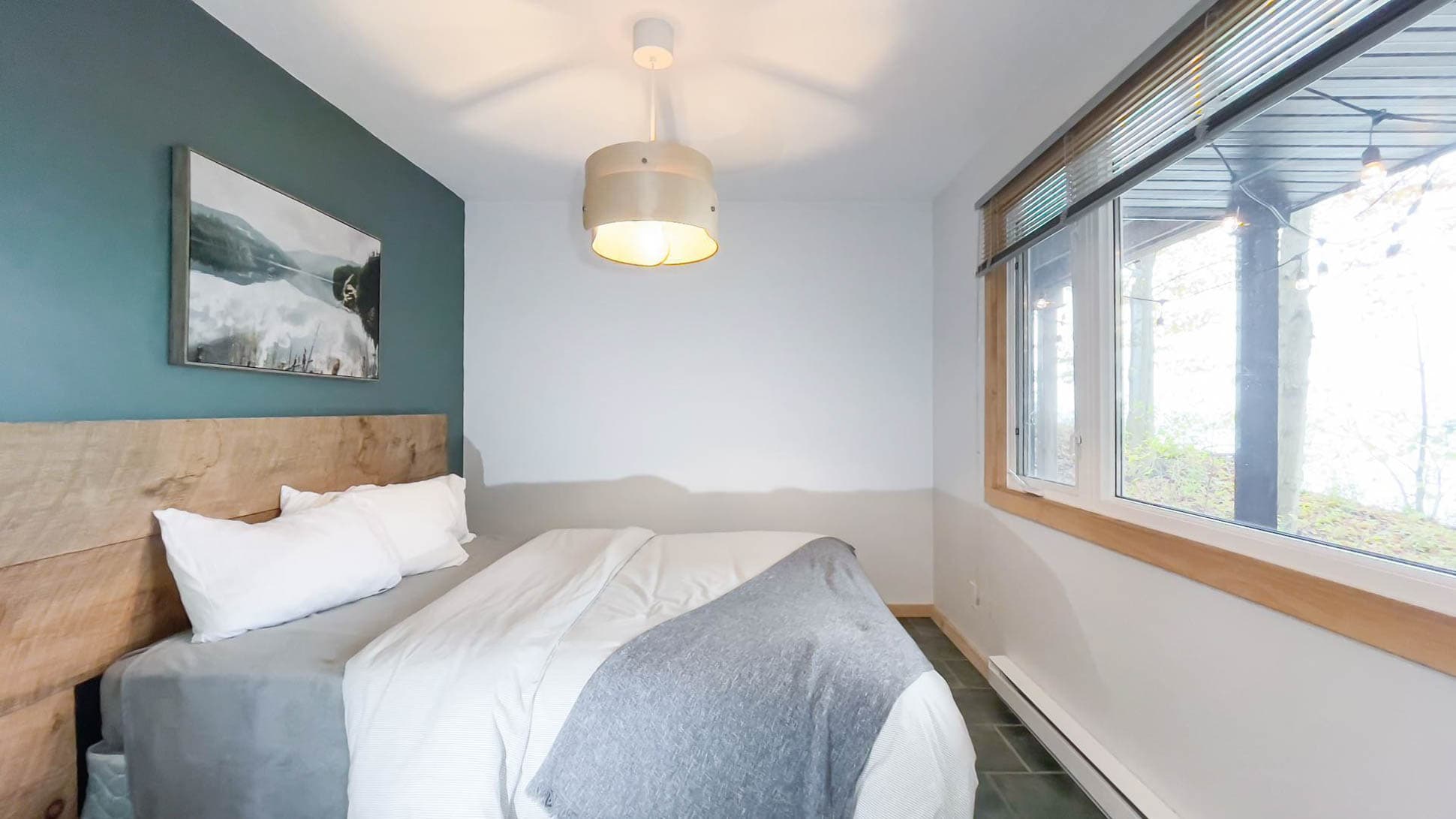 Lower BR3 with Queen bed and huge window overlooking the lake