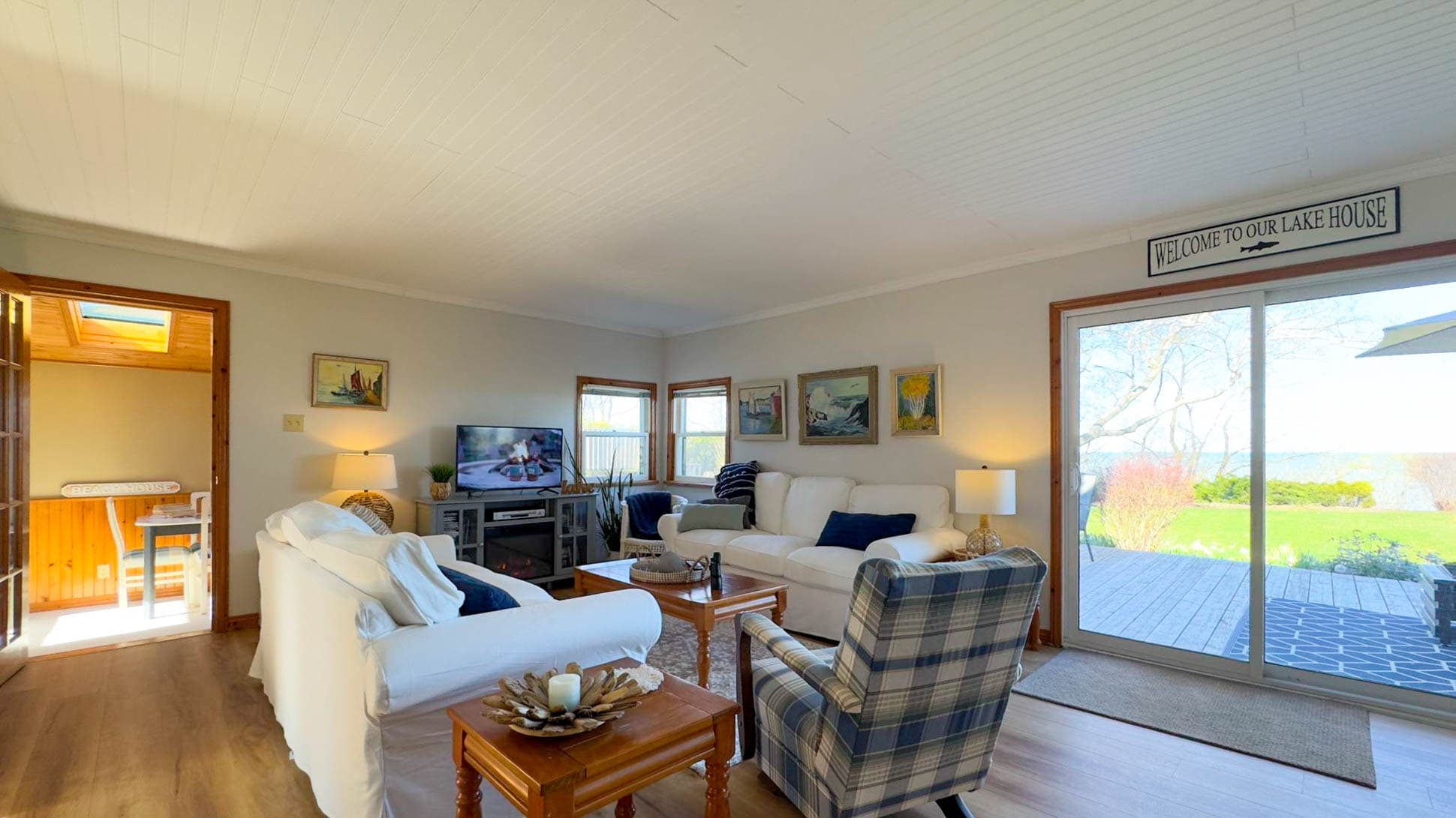 Cozy up with electric fireplace and lake views