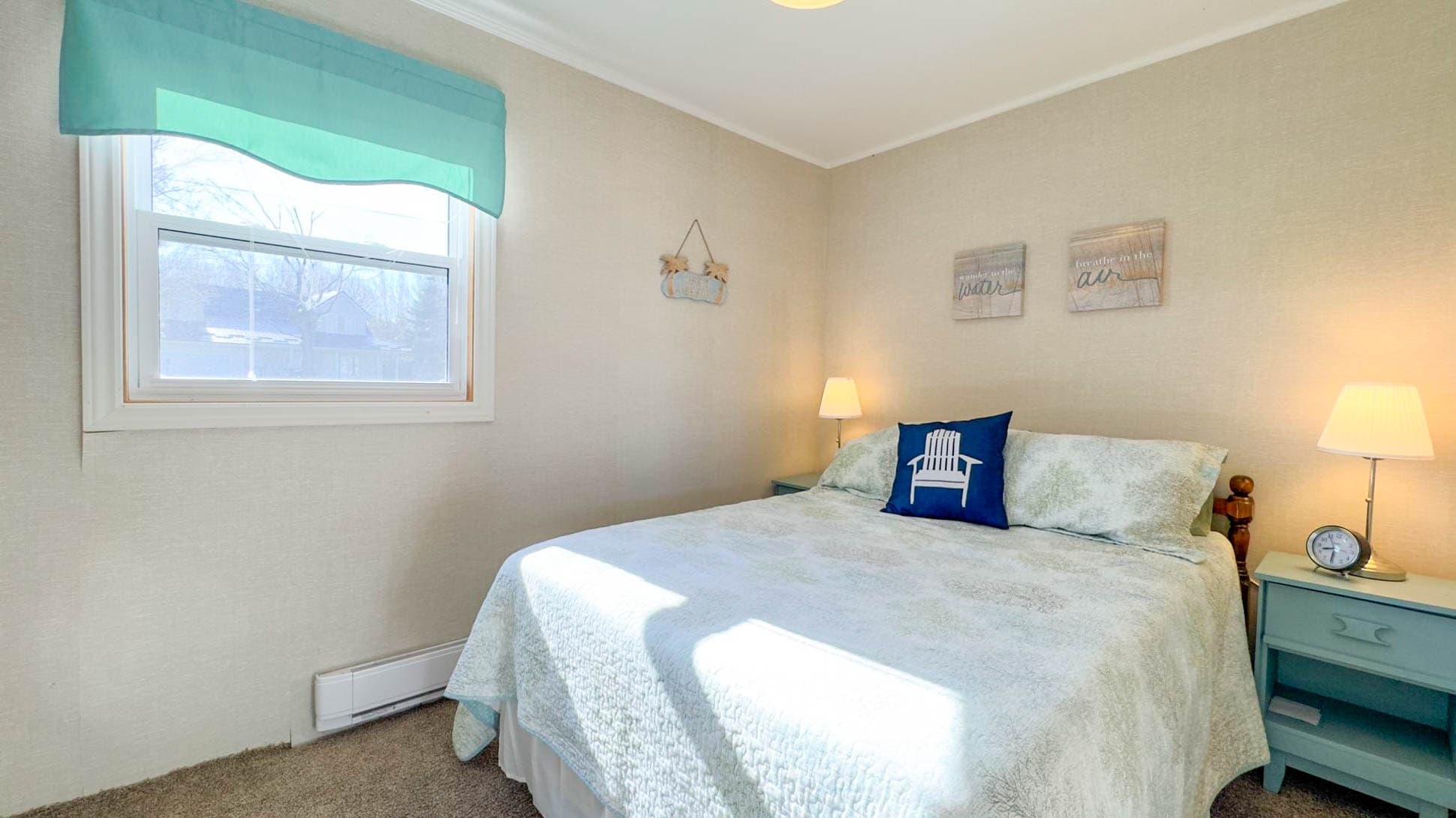 Bedroom 1 on the main floor has a Queen Bed
