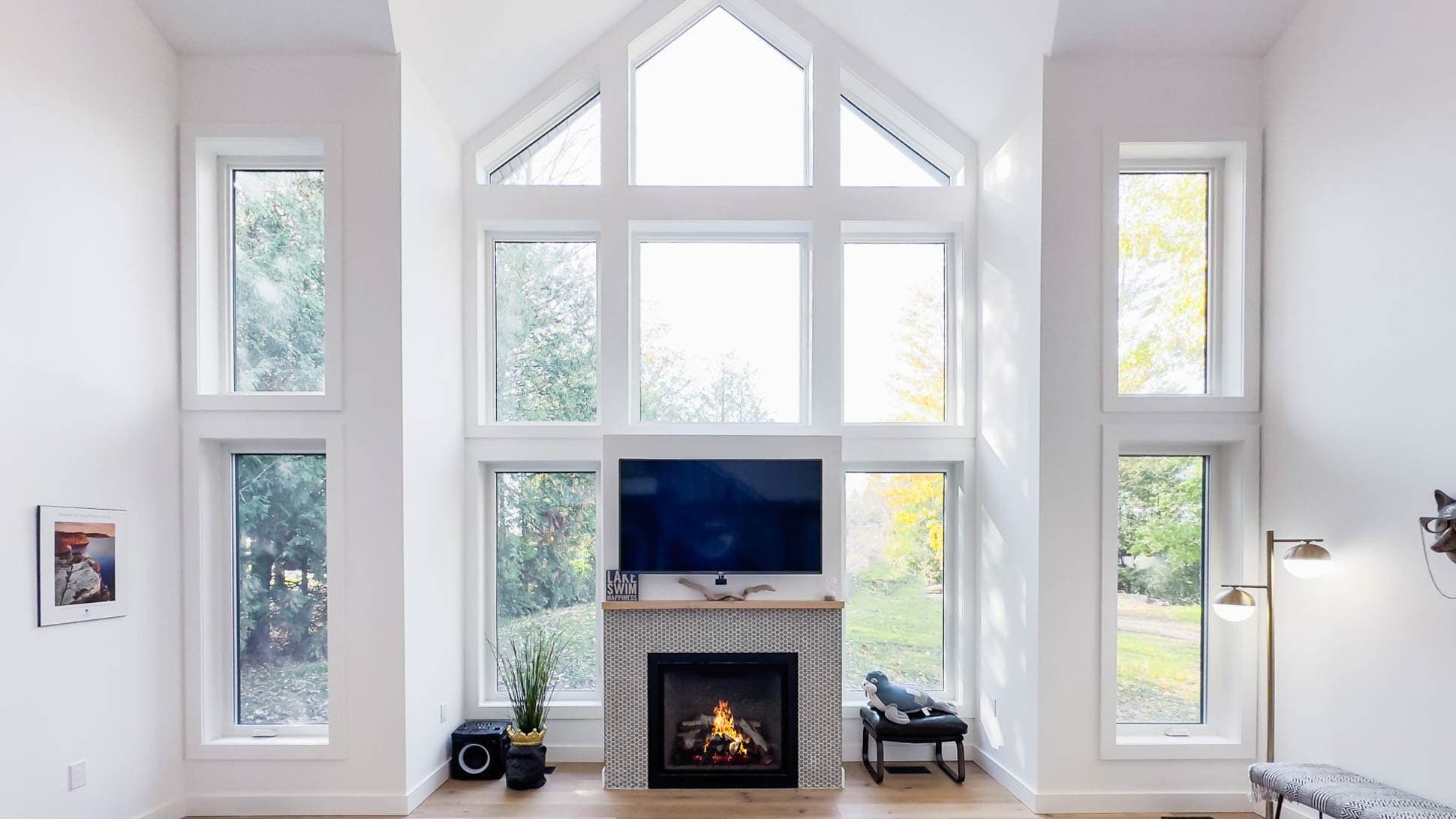Floor to ceiling windows catch the sunsets and Gas fireplace