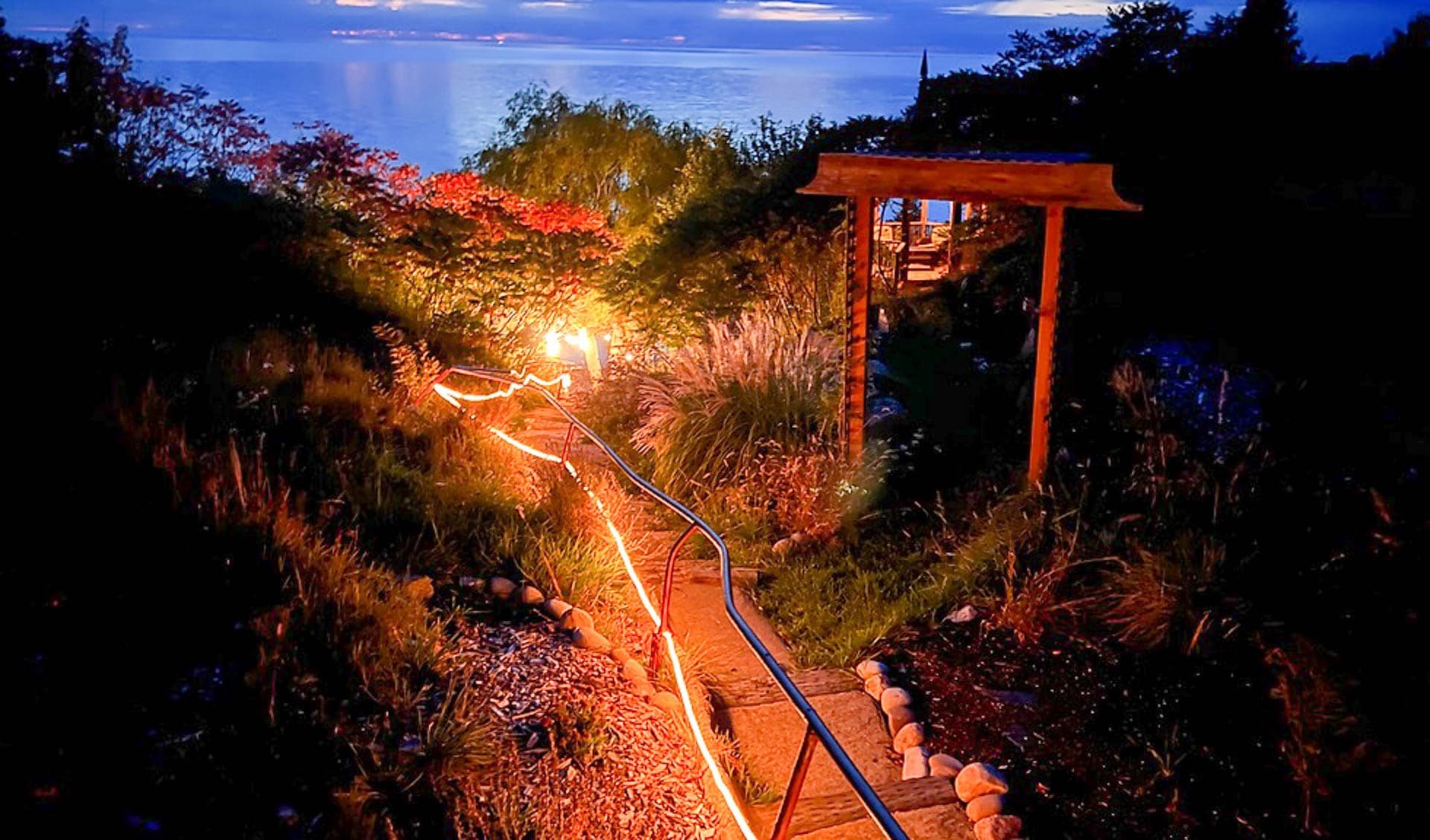 Enchanting beach stairs light the way to unforgettable evenings by the water