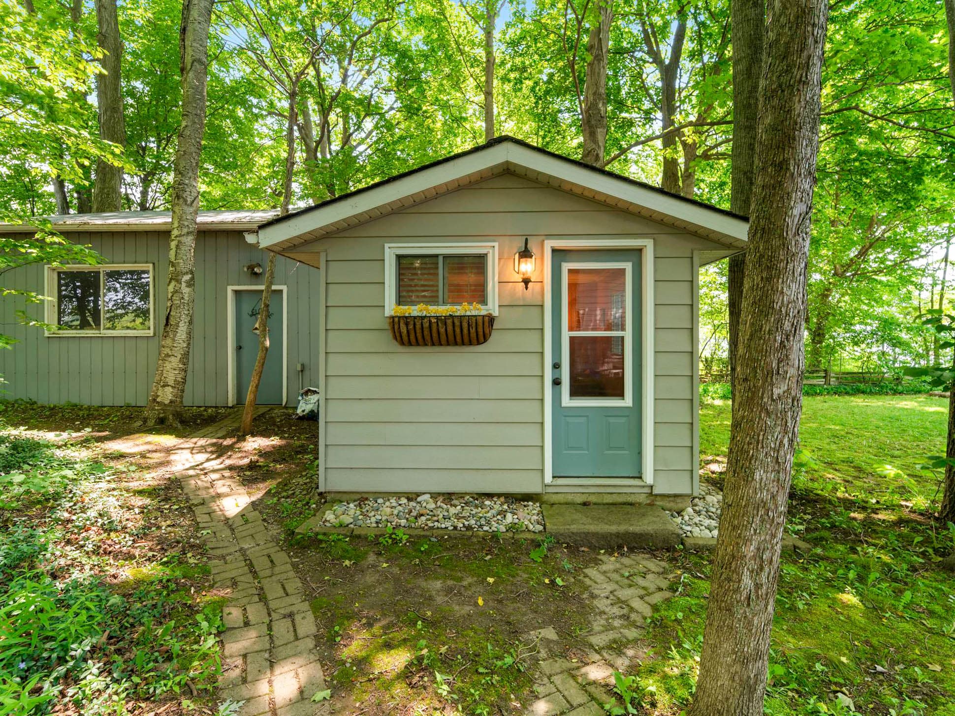A charming escape steps from the main cottage.