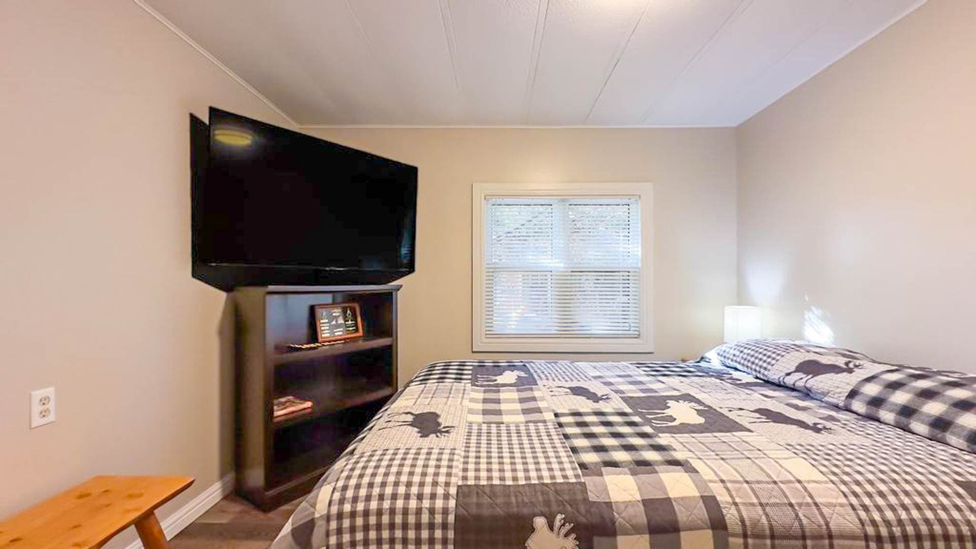 Bedroom 2 has Queen Bed and a TV