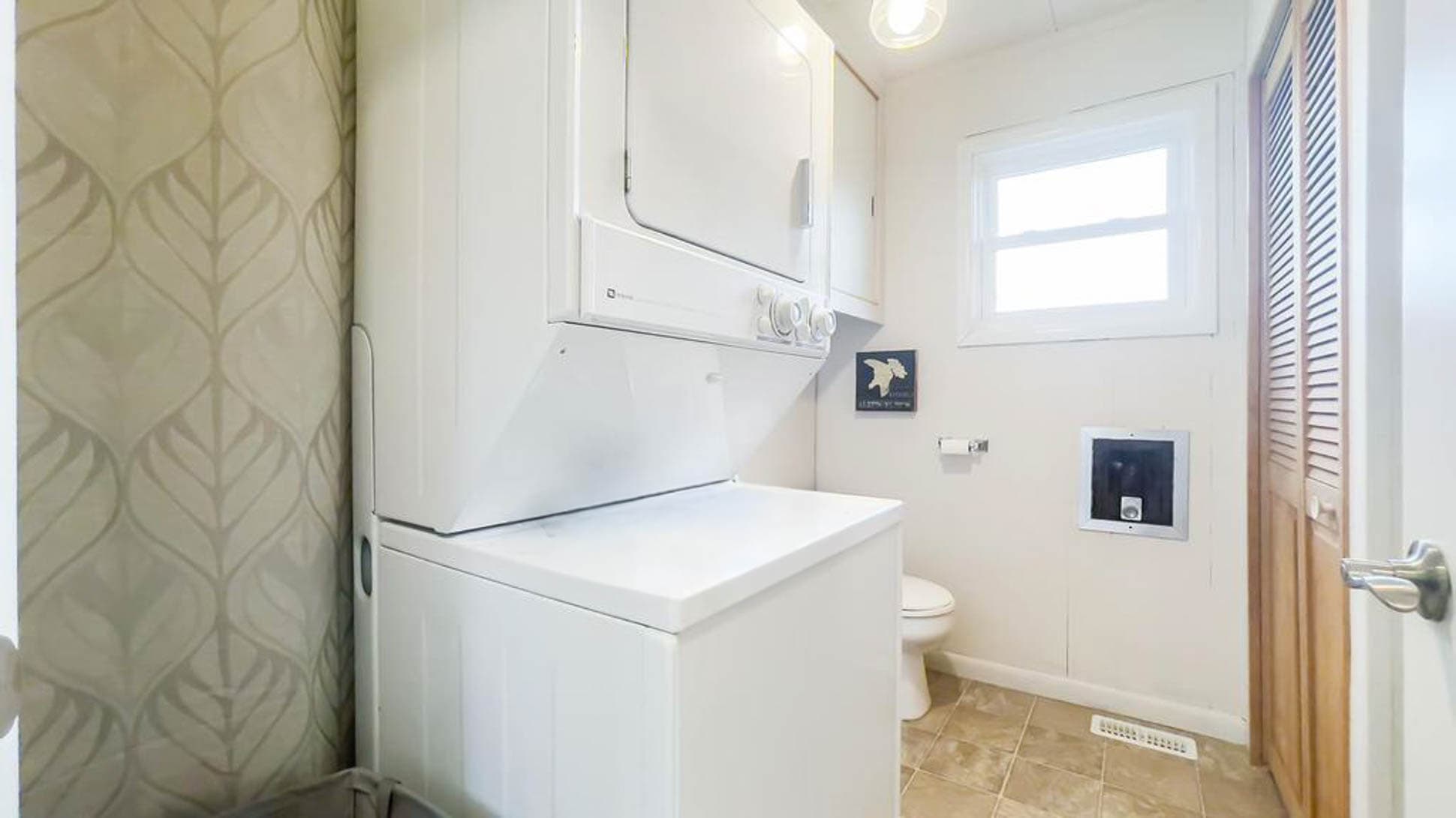 Laundry and 1/2 bath - don't have to bring wet bathing suits home!