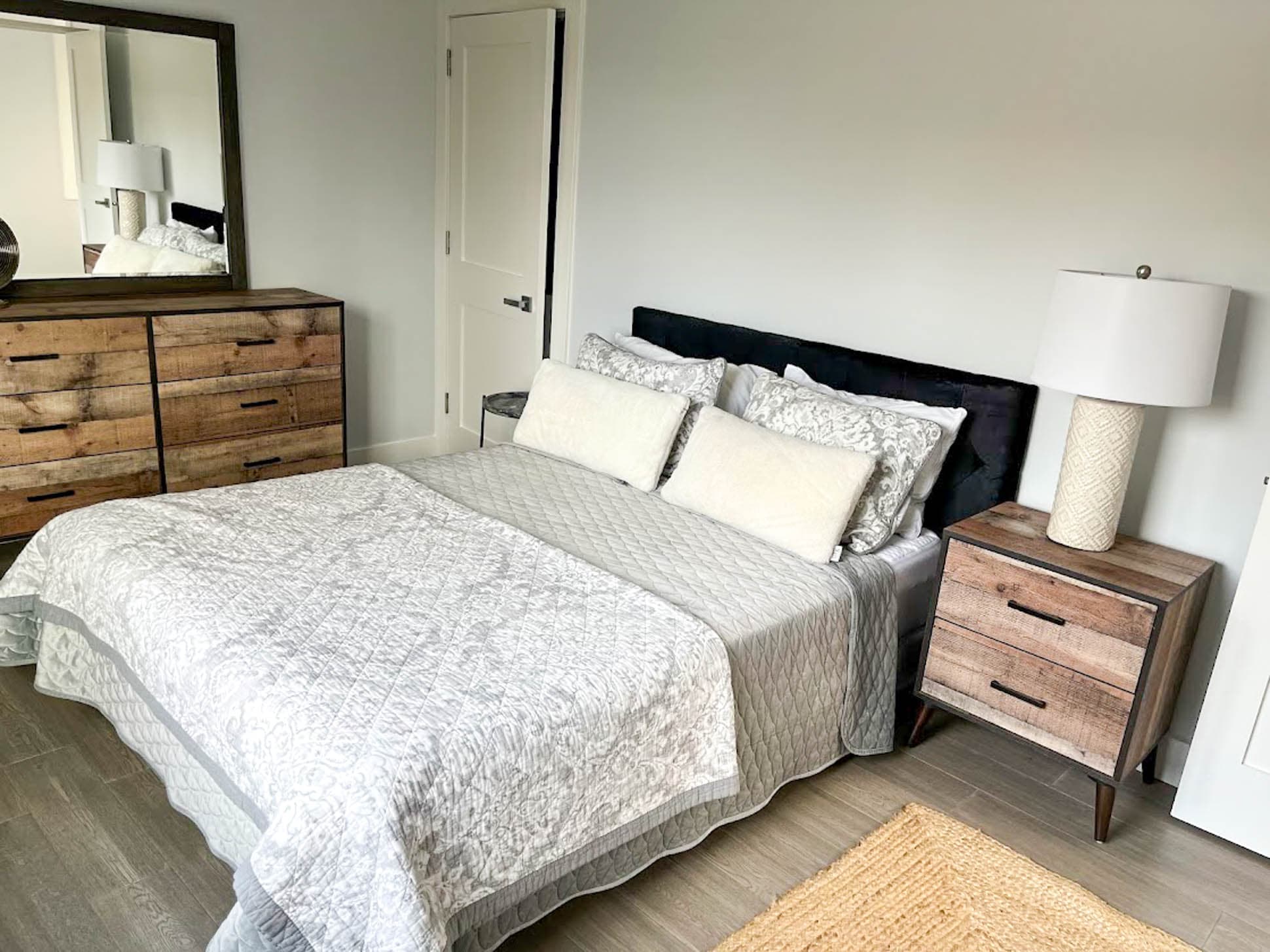Third bedroom on upper level with queen-sized bed and view