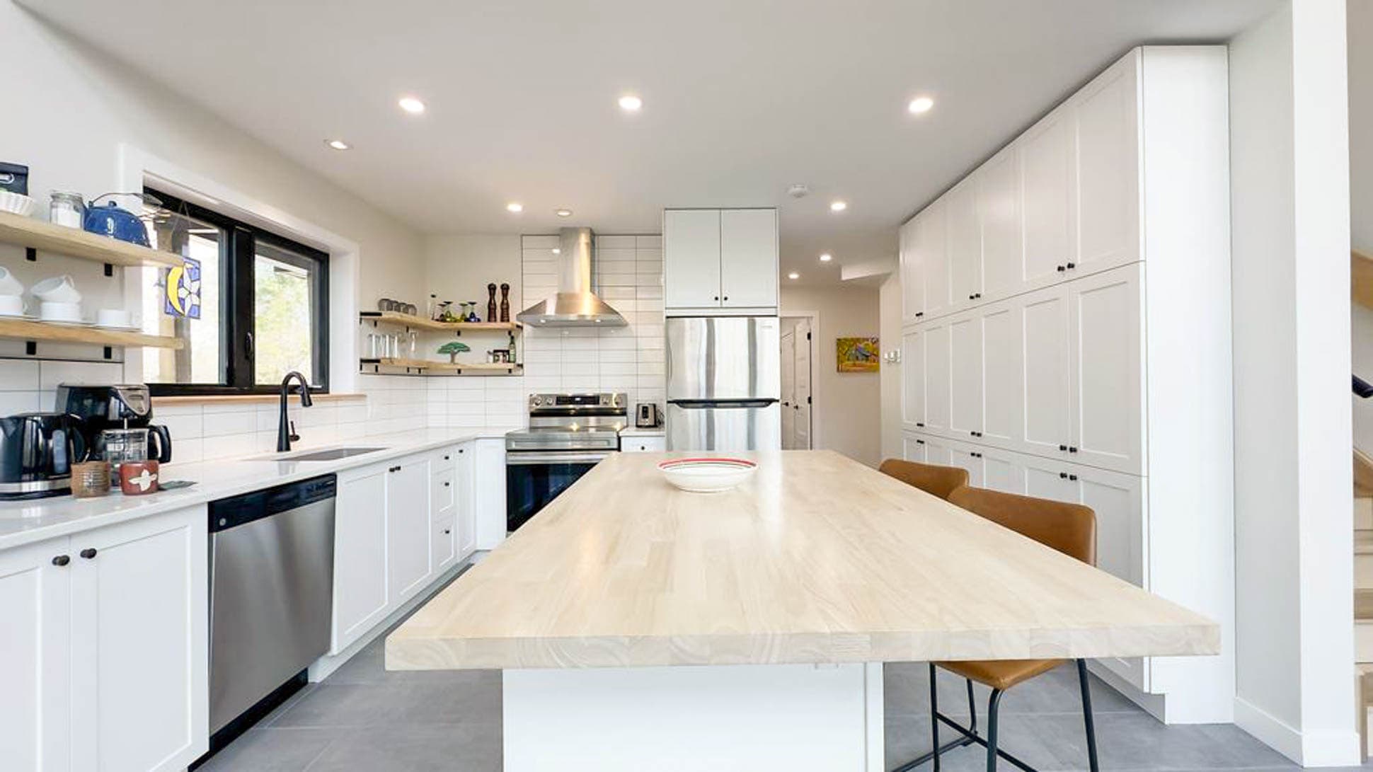 A bright, clean kitchen with everything you need to prepare your favorite meals