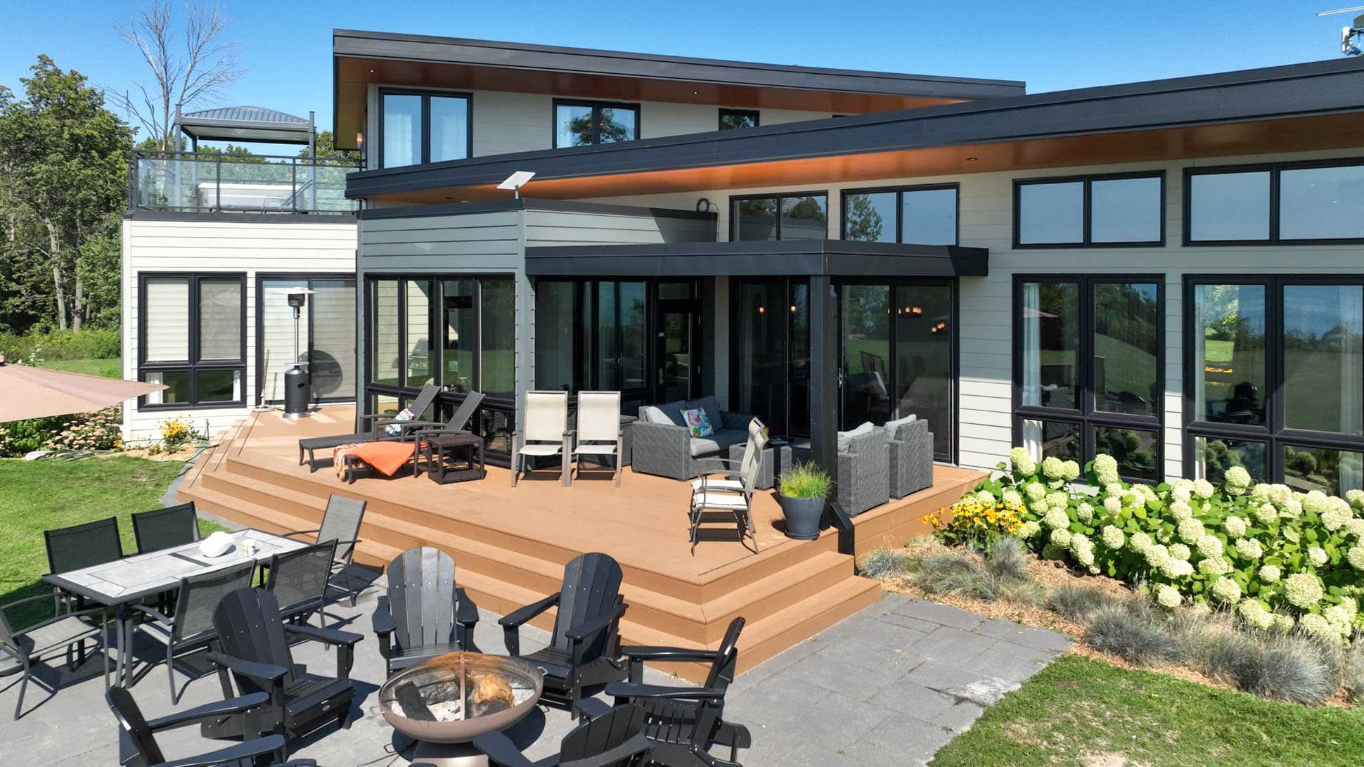 Soak up the sun and unwind on our expansive deck with ample seating