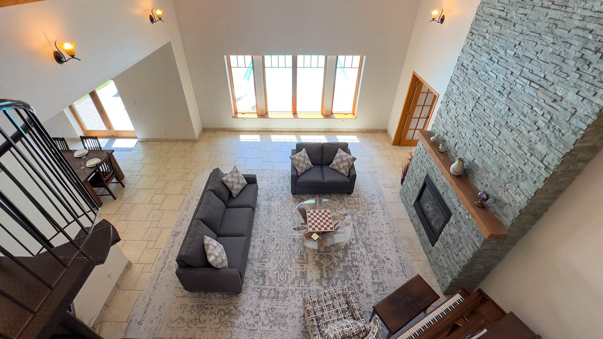 Cozy up by the fireplace in our stunning great room