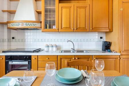Kitchen with Utensils, Courtesy Kit, Lavazza Coffee Machine, Refrigerator and Dishwasher