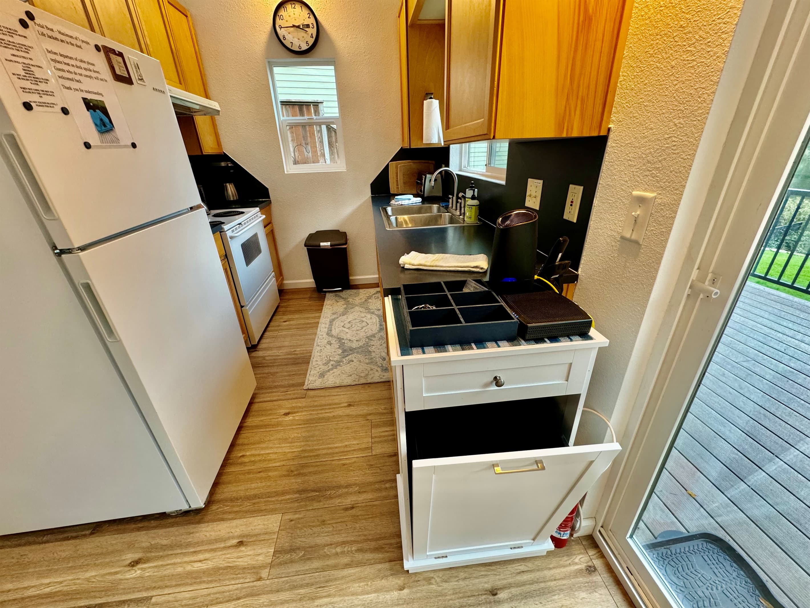 sliding glass door to deck, easy to access BBQ and the outside table for dining alfresco