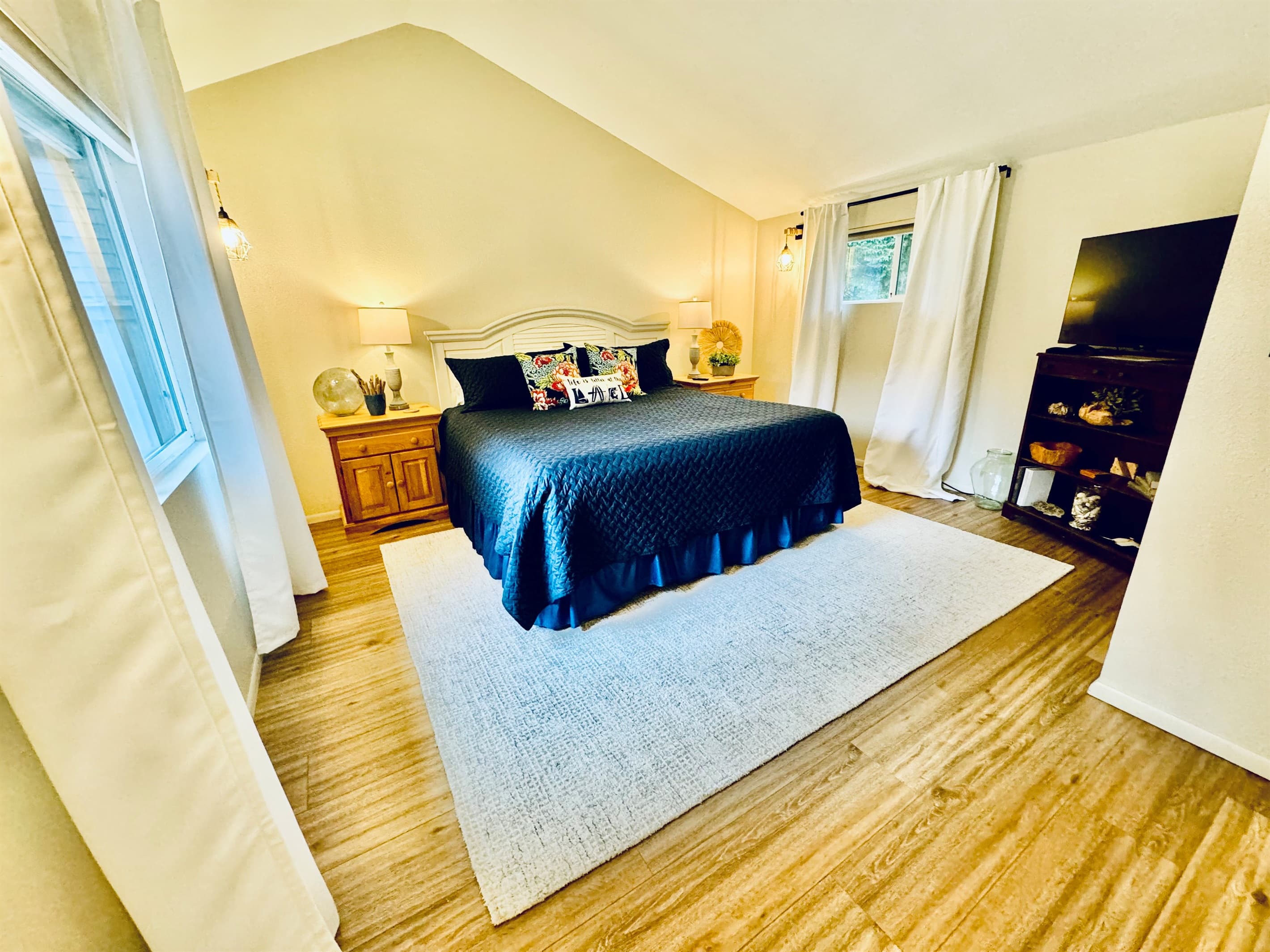 King bedroom with TV