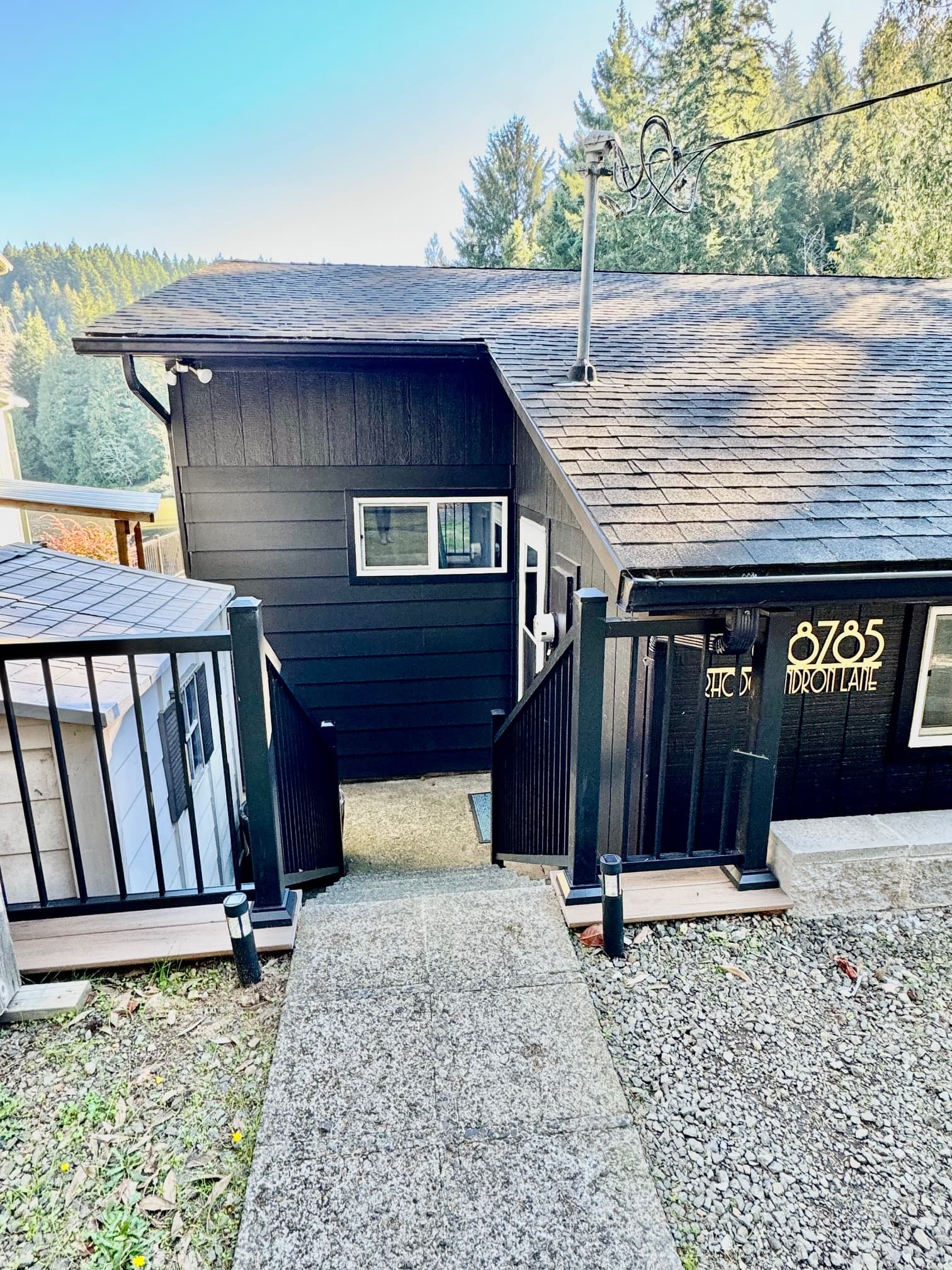 stairs down to house from parking
