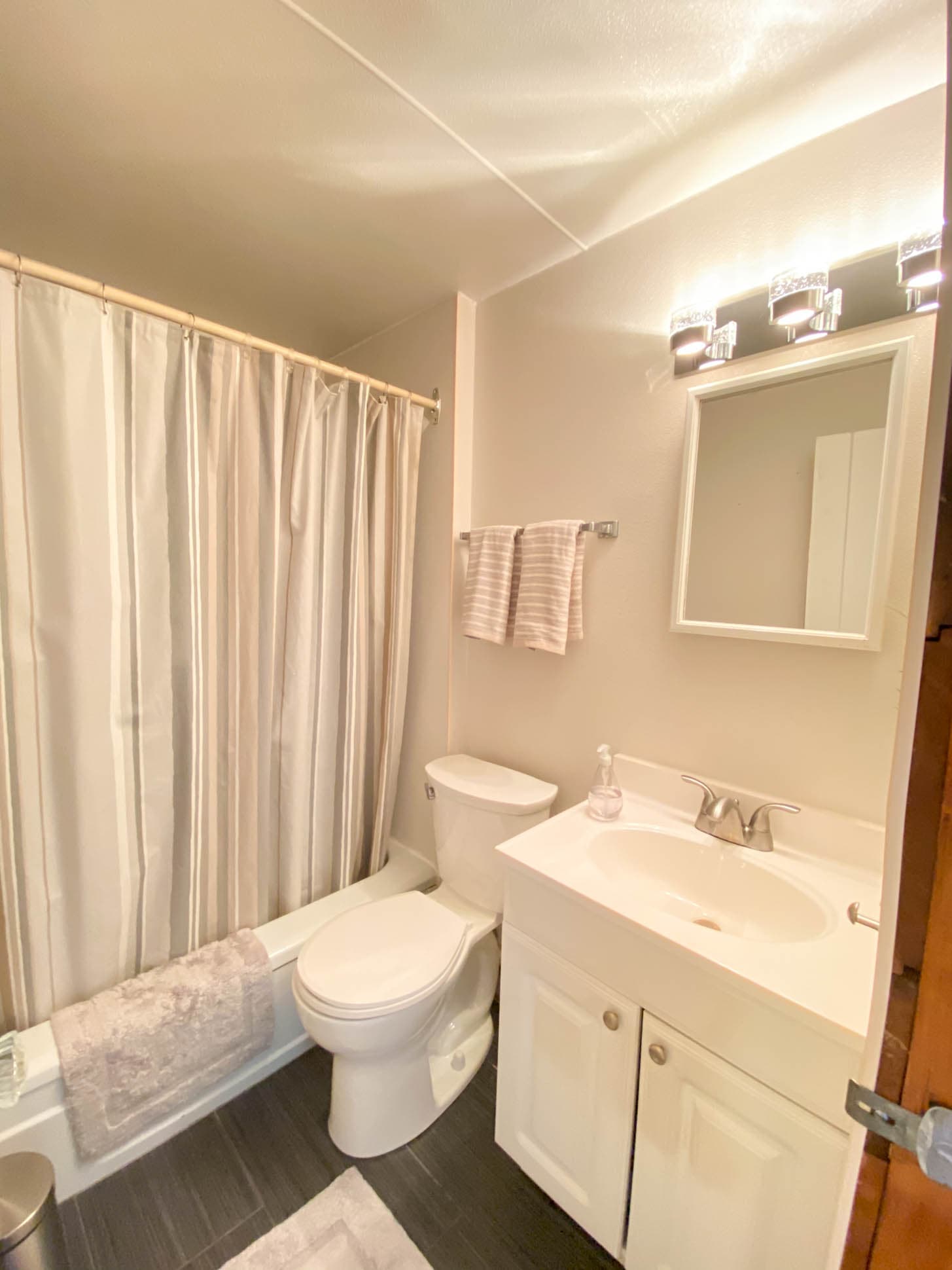 4 Piece bathroom comes with a tub and shower combination and plenty of storage in the vanity.