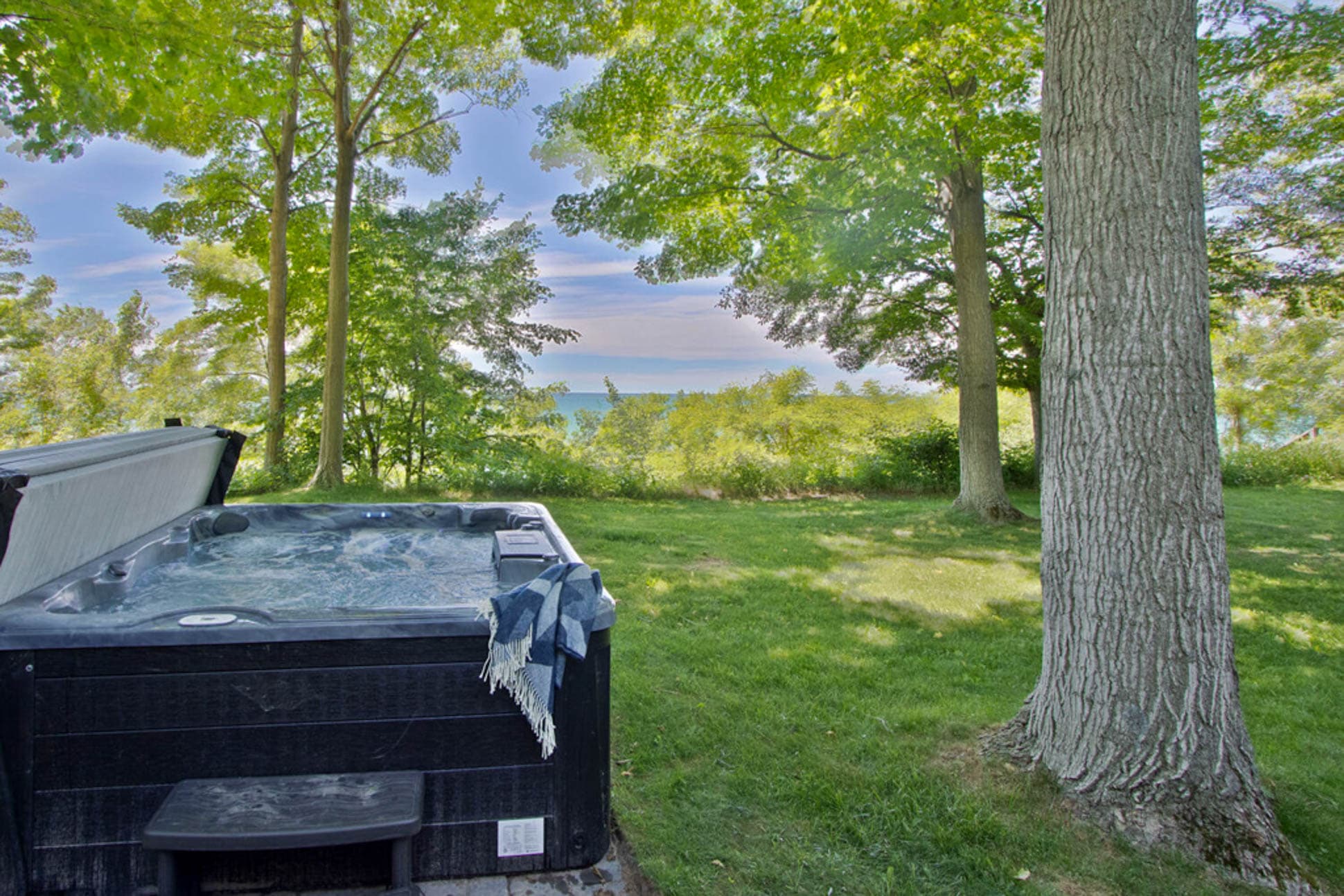 Let the bubbles soak your cares away while watching the waves of Lake Huron