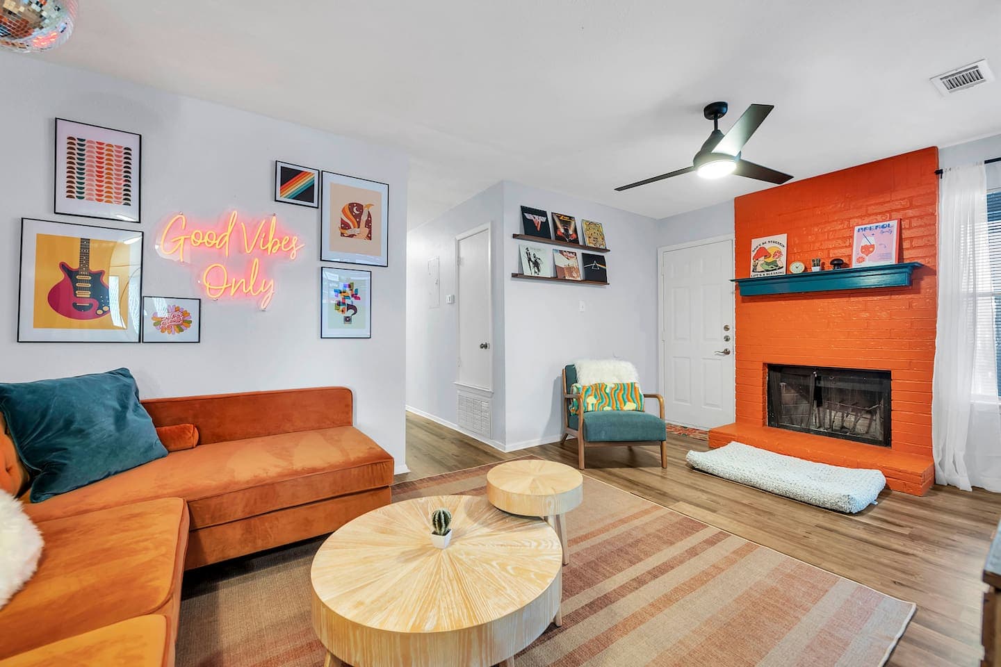 Our groovy 1970s-inspired living room, complete with vintage decor and funky colors for a far-out experience