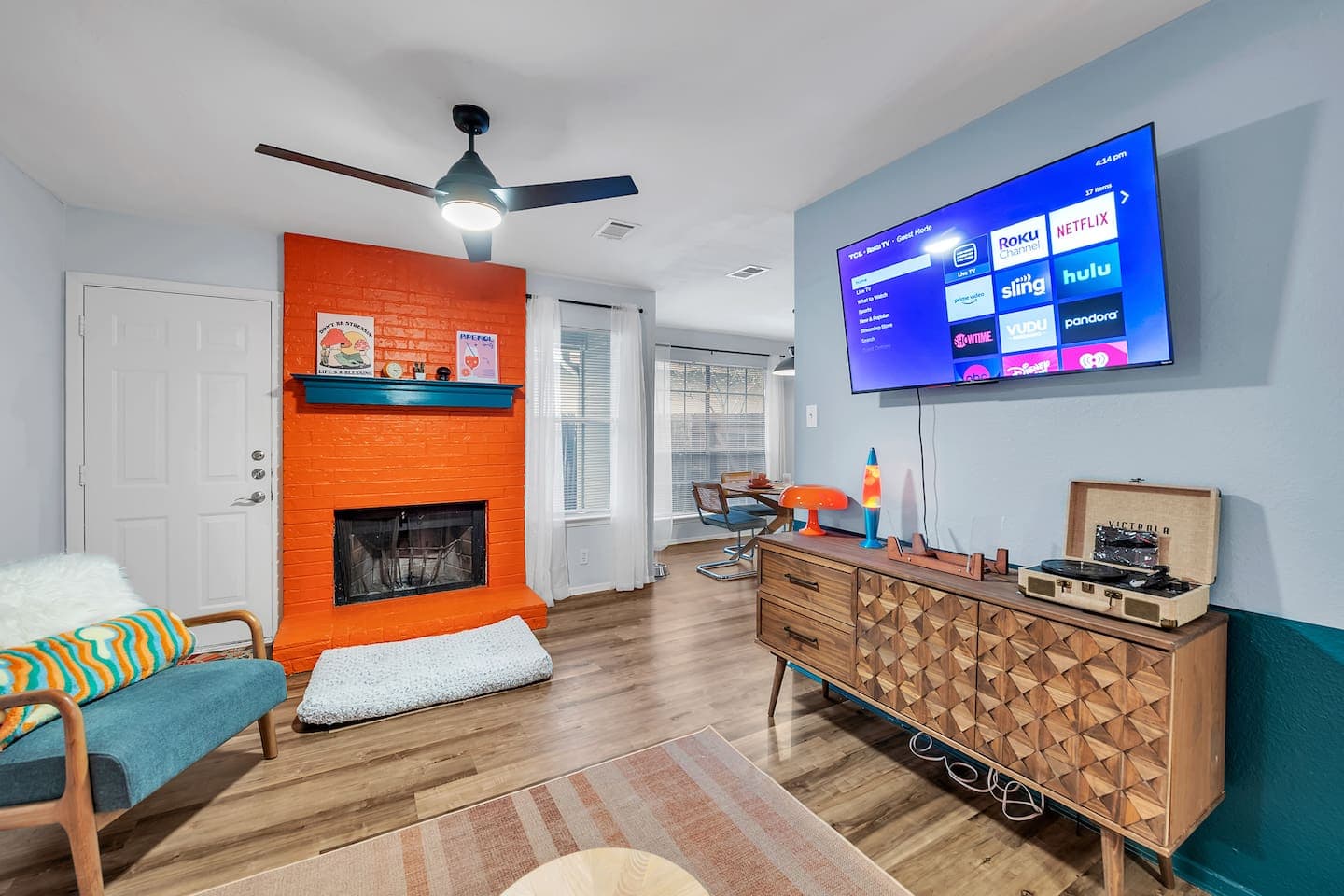 Please note the TV swings out from the wall to angle toward the sofa