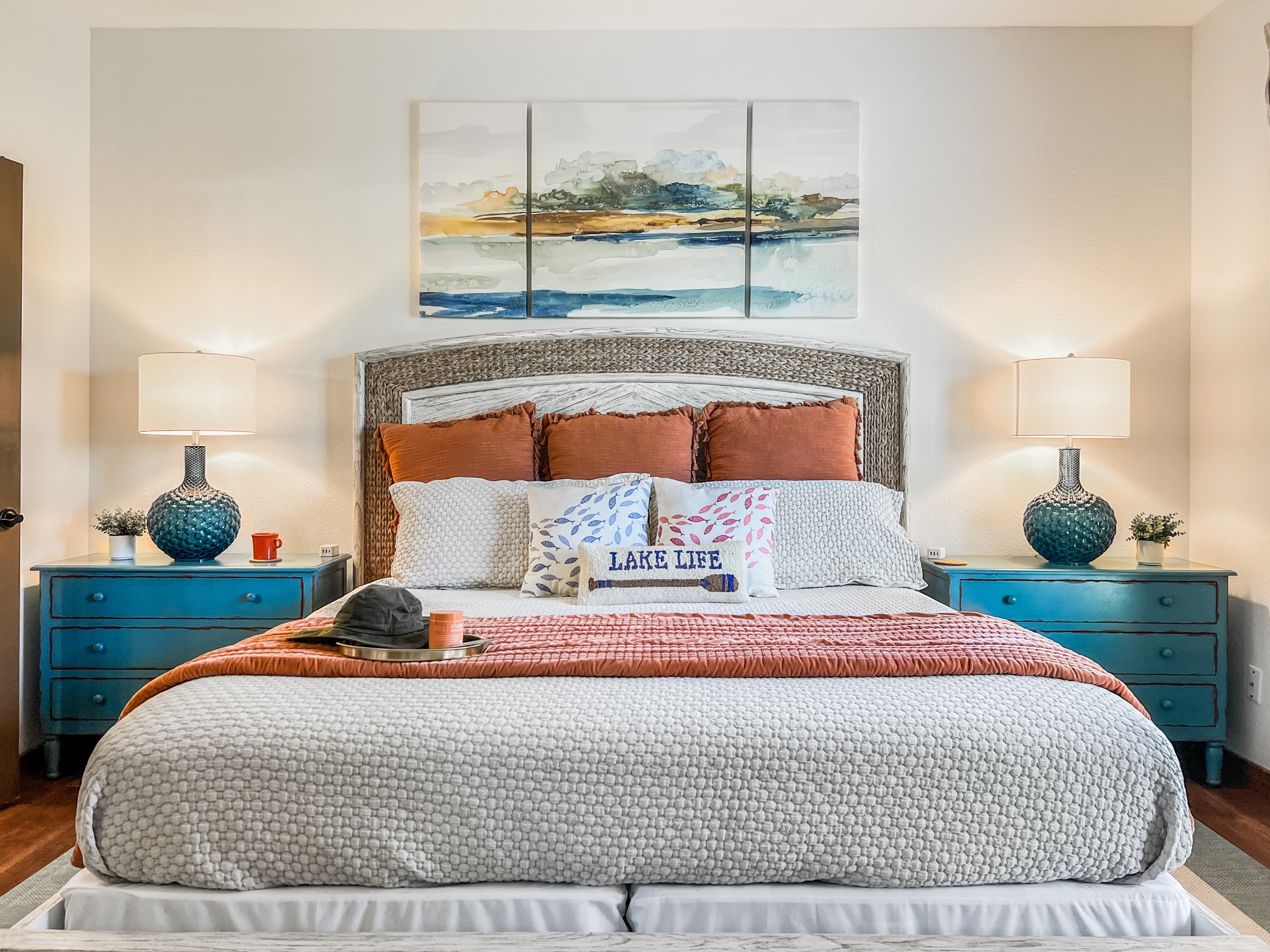 Wake up in the main-level master bedroom — king bed, ensuite jacuzzi, and Roku TV