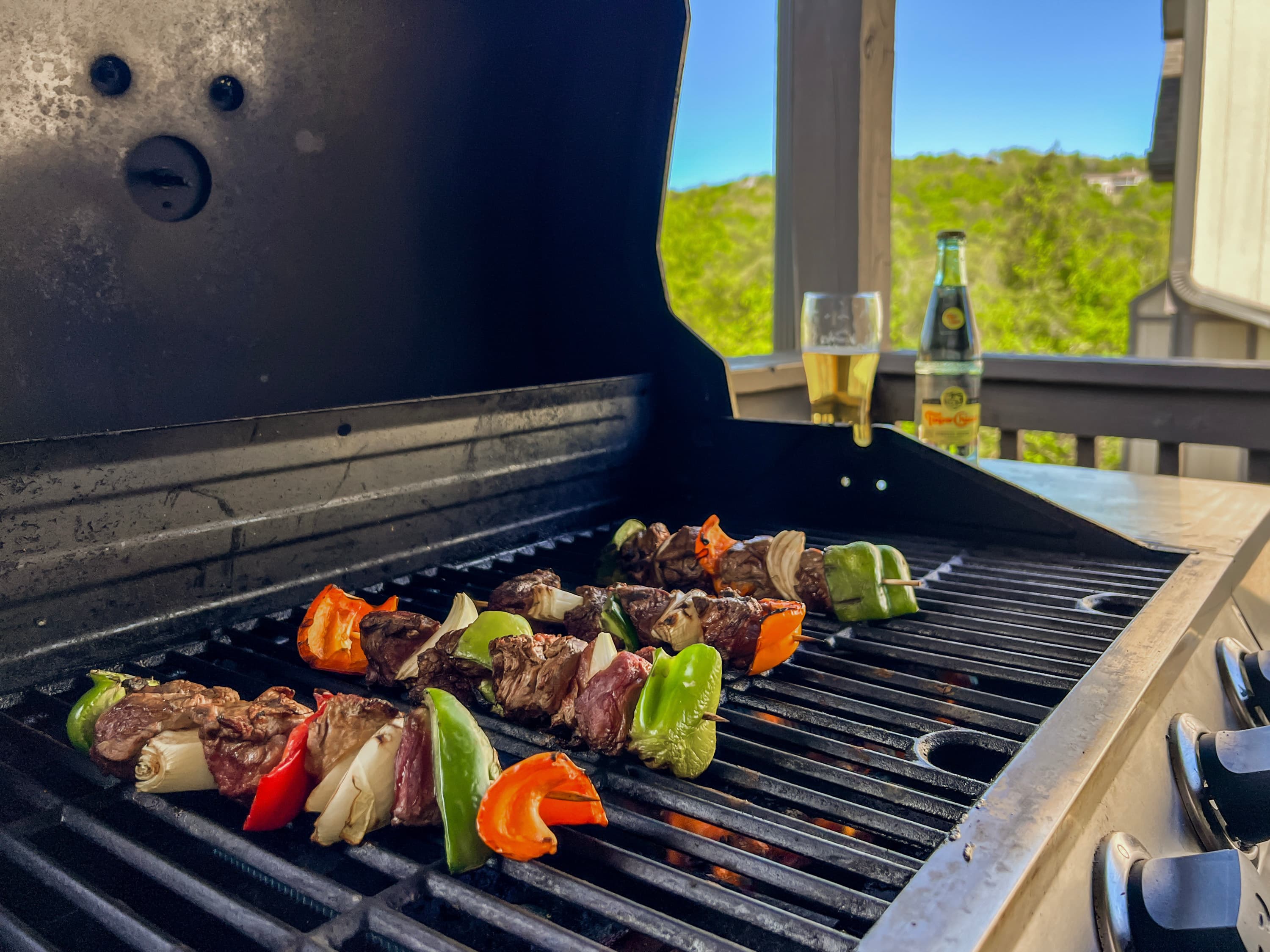 Fire up the grill on the covered mountain-view deck and cook for the whole group