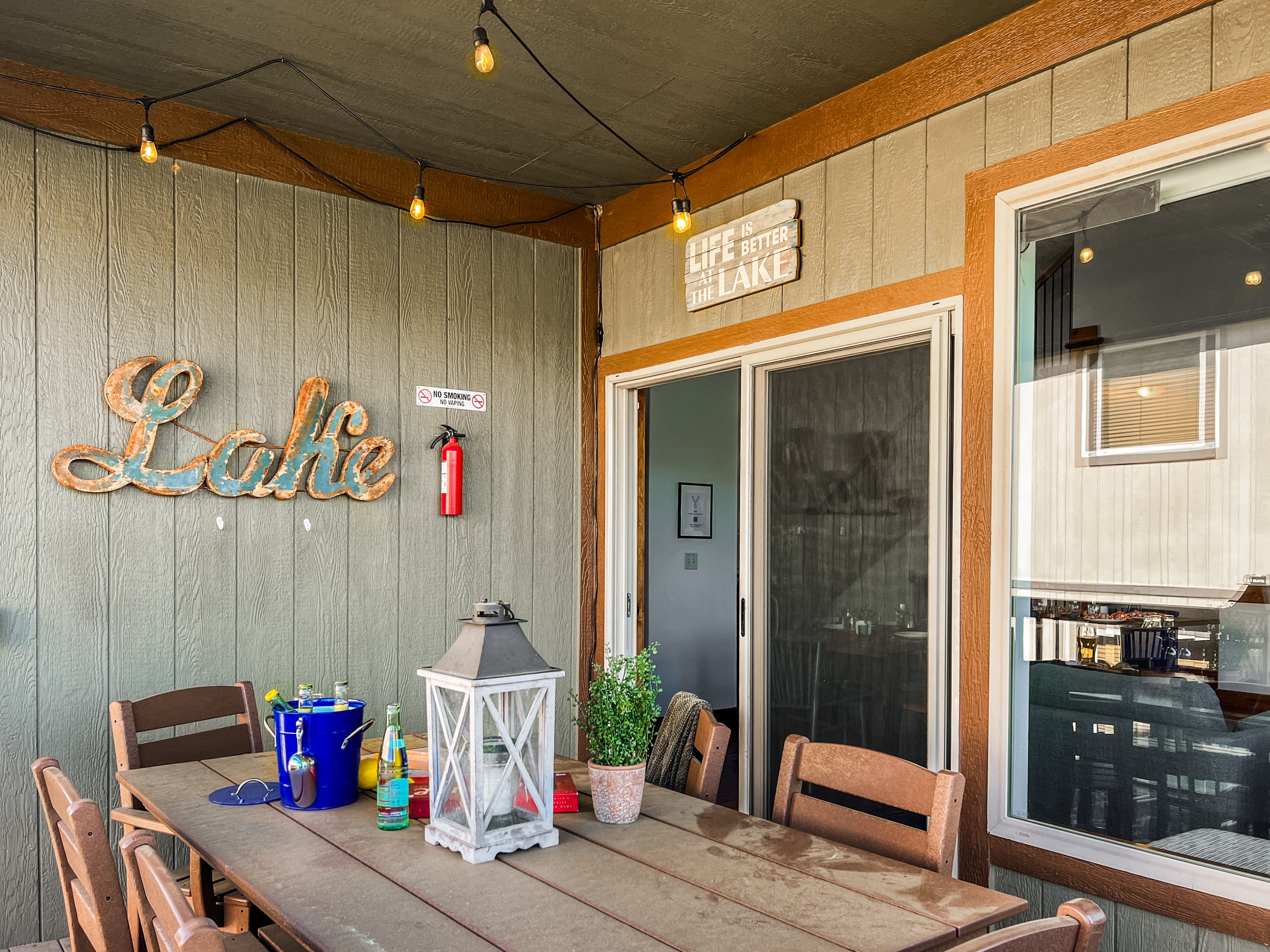 The themed patio decor sets the scene — grab a seat and let the mountain air do the rest