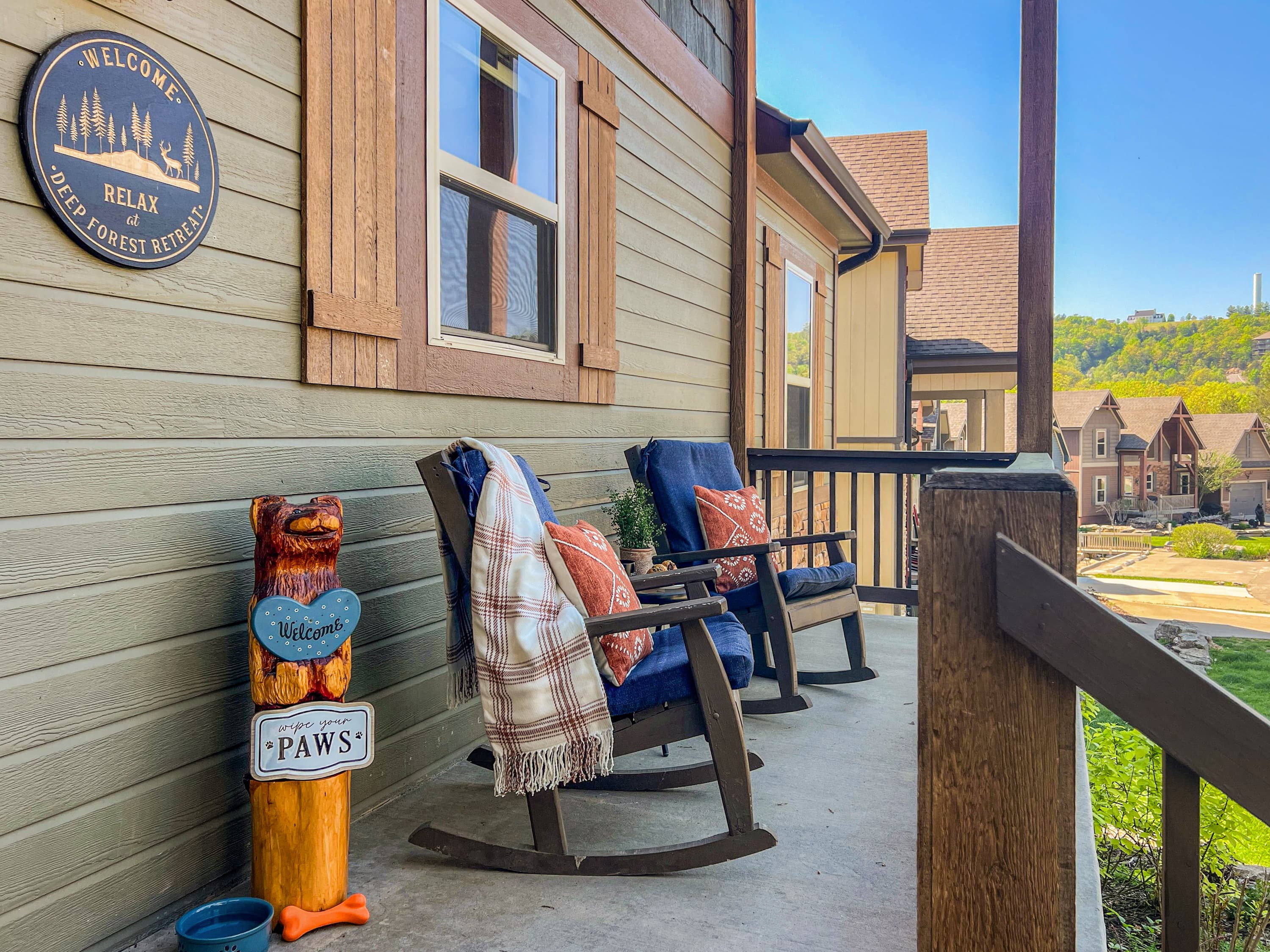 Settle into the front porch rocking chairs and take in the peaceful Branson Canyon neighborhood